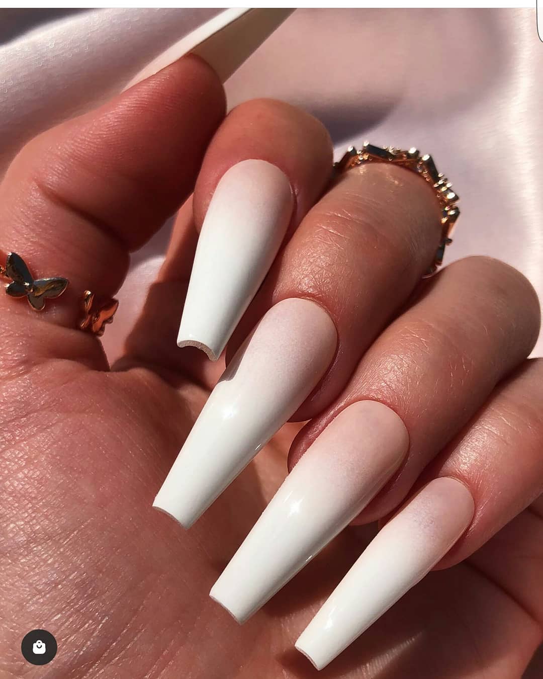 How bold do you dare to go? This long white acrylic manicure will look amazing for the prom season, as well as for women who like to look fierce with their chosen design.