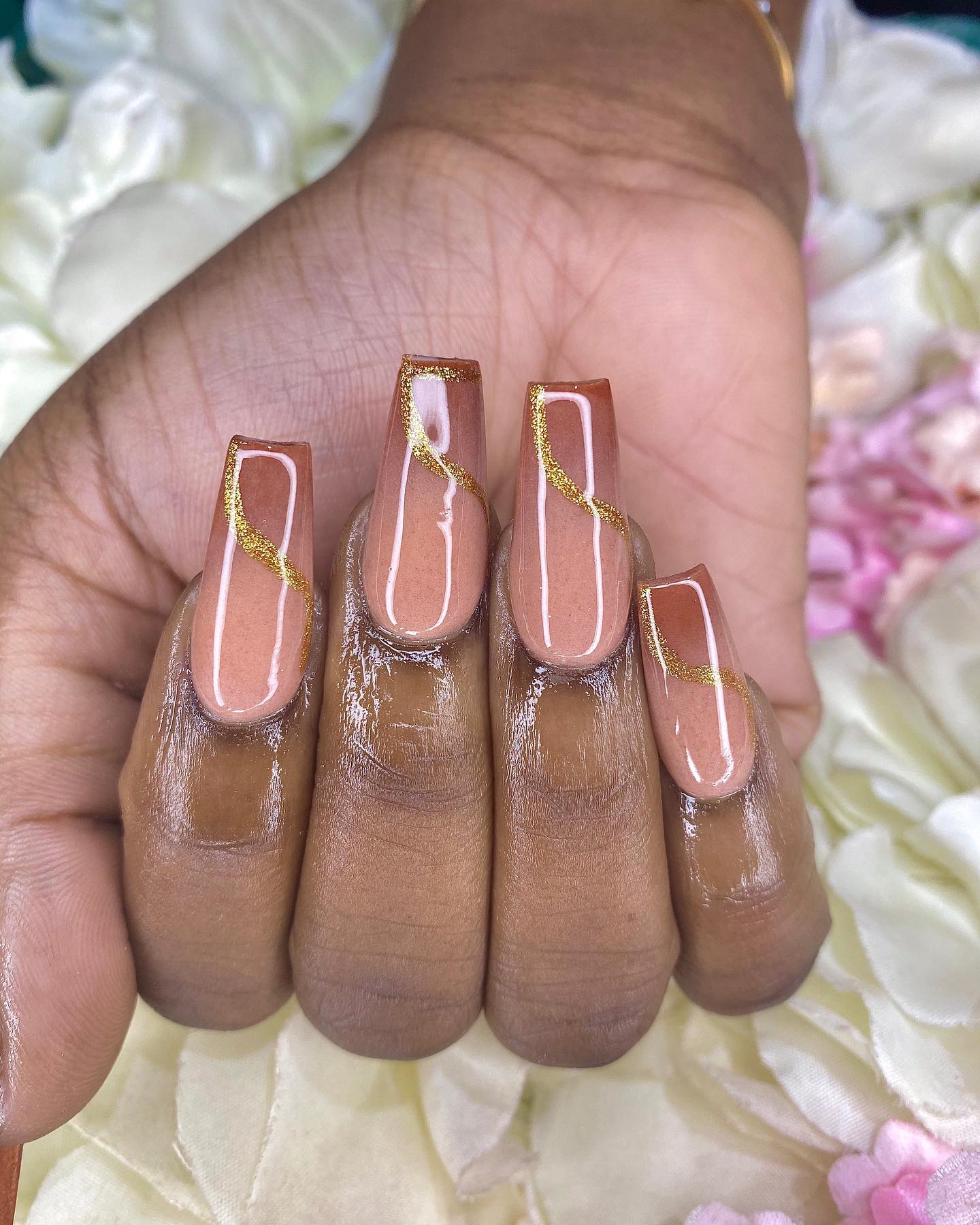 Nude acrylics and this shade of brown will attract a ton of looks and attention. Show them off for your formal and elegant moments.