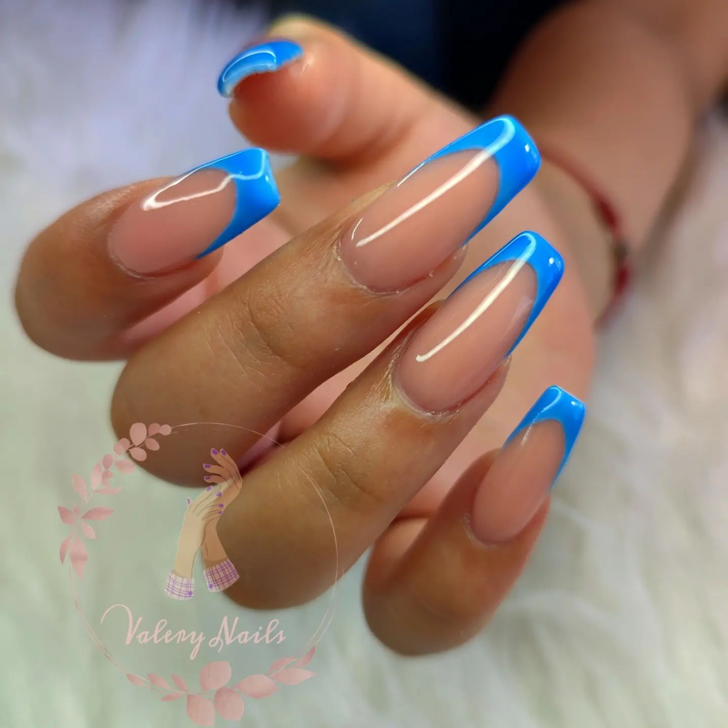 Long and sleek, this light blue French manicure is for women who enjoy soft options and subtle color transformations.