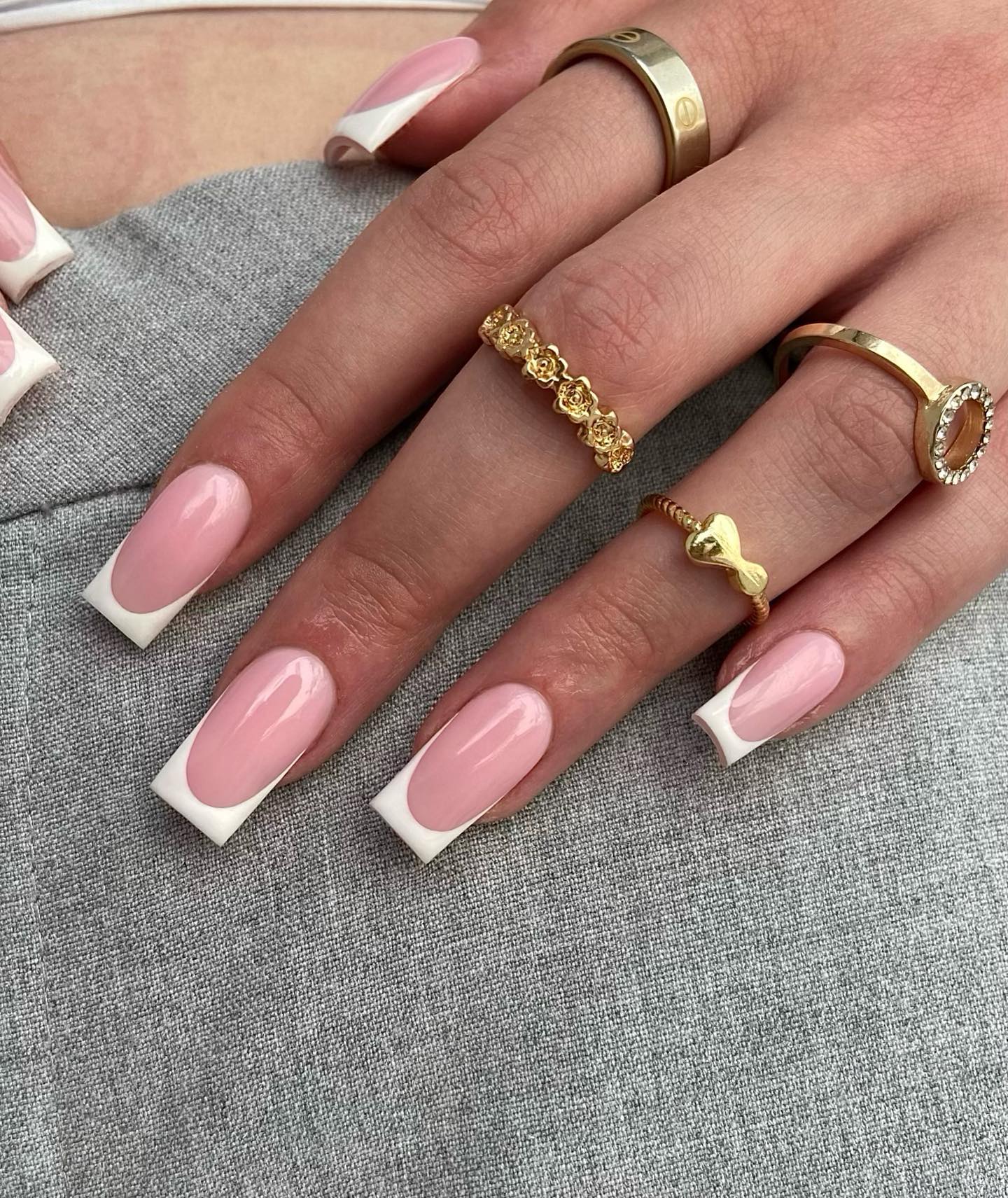 A pink base paired with your French nail tip will look classy and sophisticated.