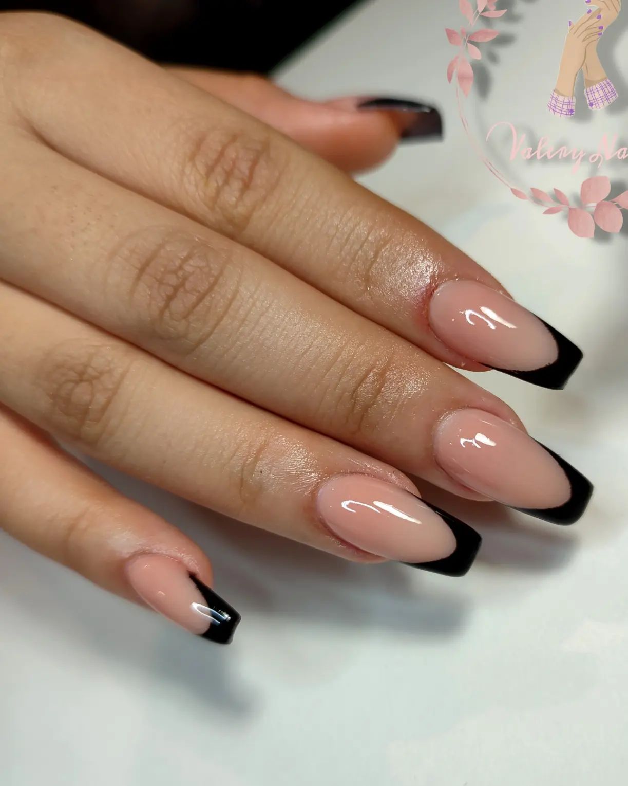 You can easily achieve this manicure on your own. Get the right shade of nude and black and color away! You’ll love these if you fancy darker French nails.
