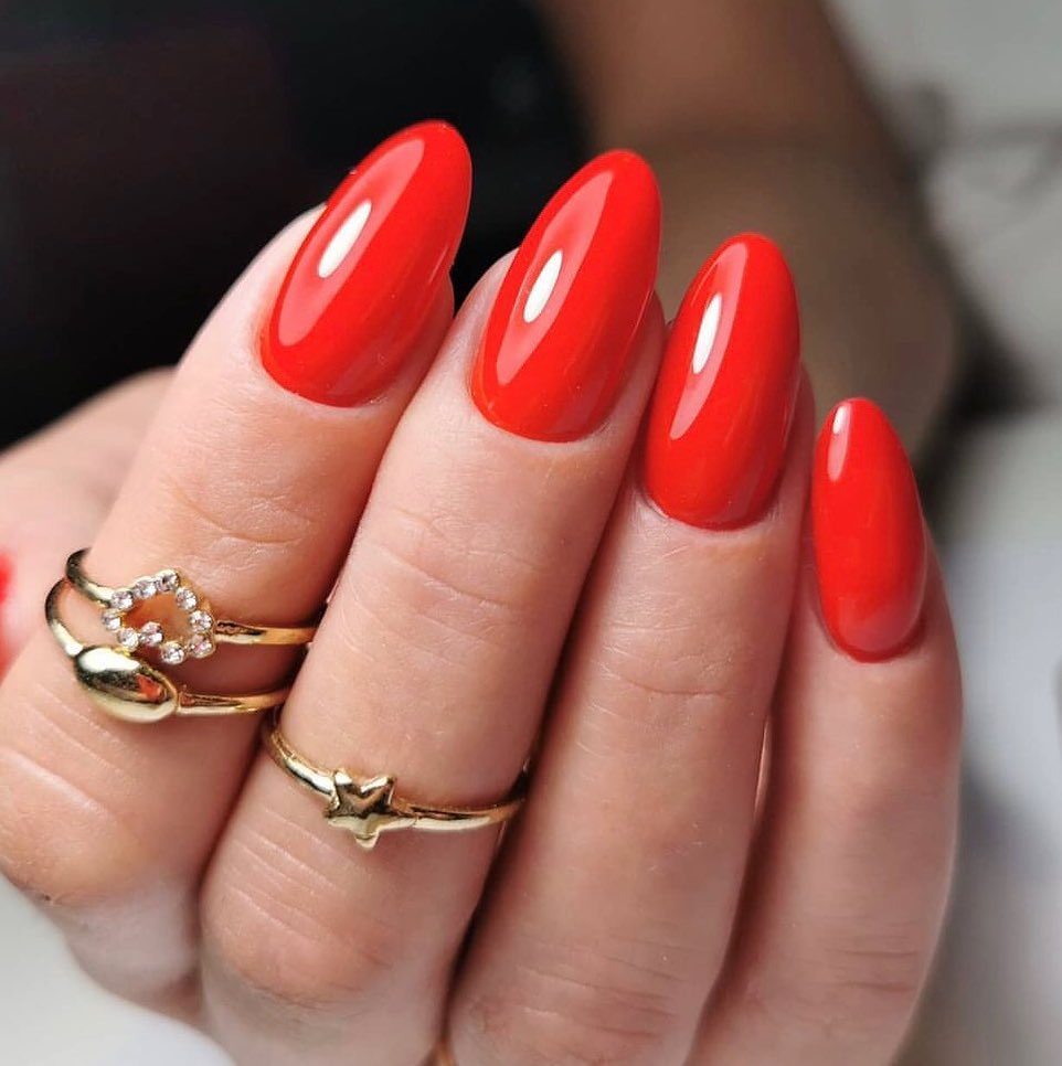 Hot red nails and this shade are a must-do for women who enjoy elegant and feminine manicures.