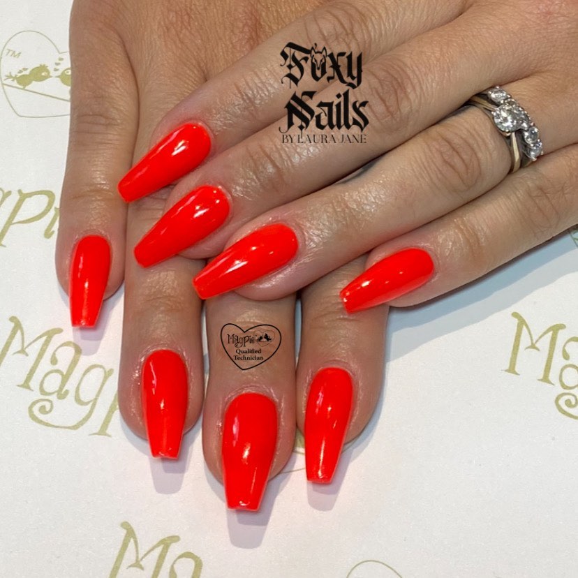 If you’re looking for the perfect summer manicure that is bright and fun, this shade of red is it!