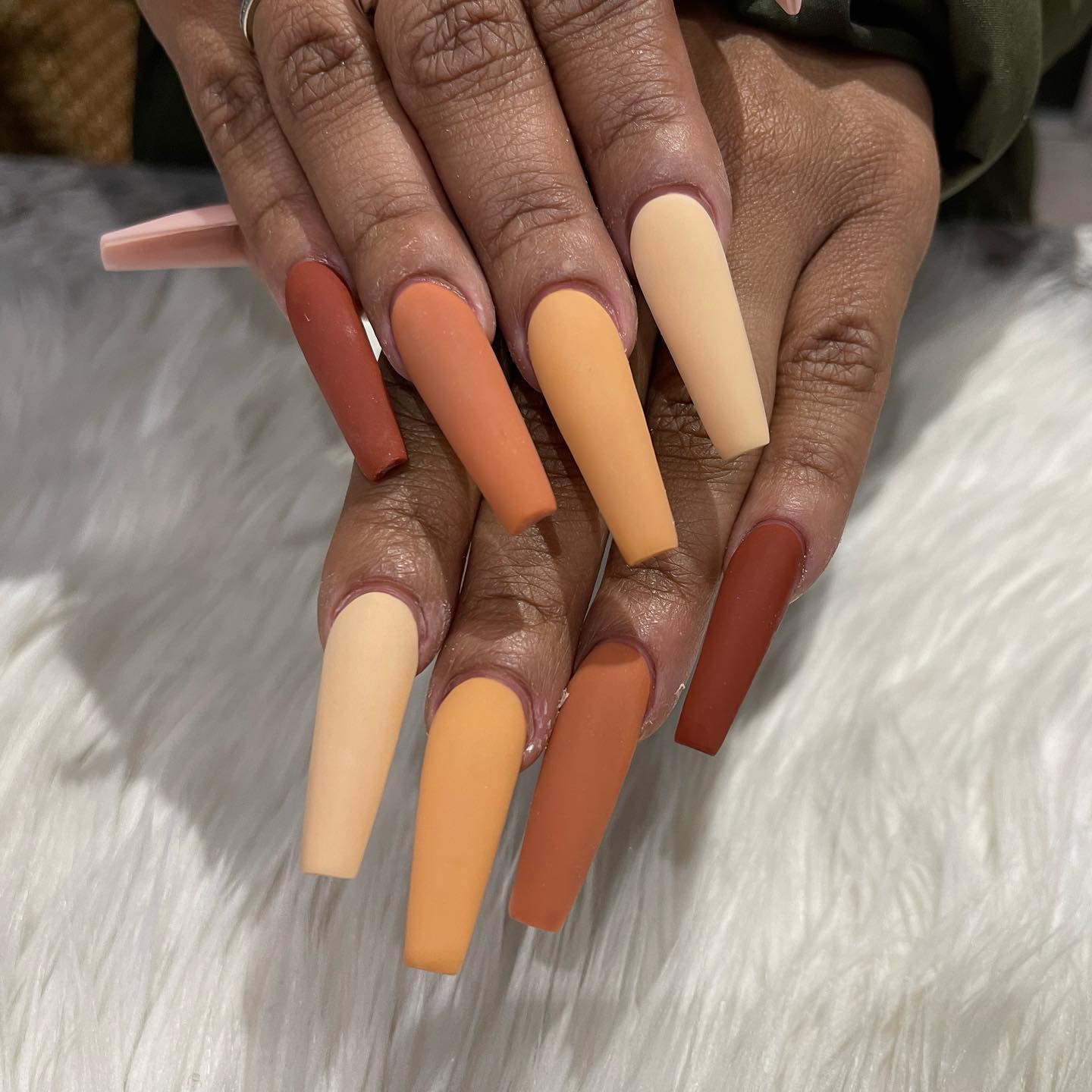 How about this long matte coffin acrylic manicure? Go for all the shades of nude and show them off for any type of event.