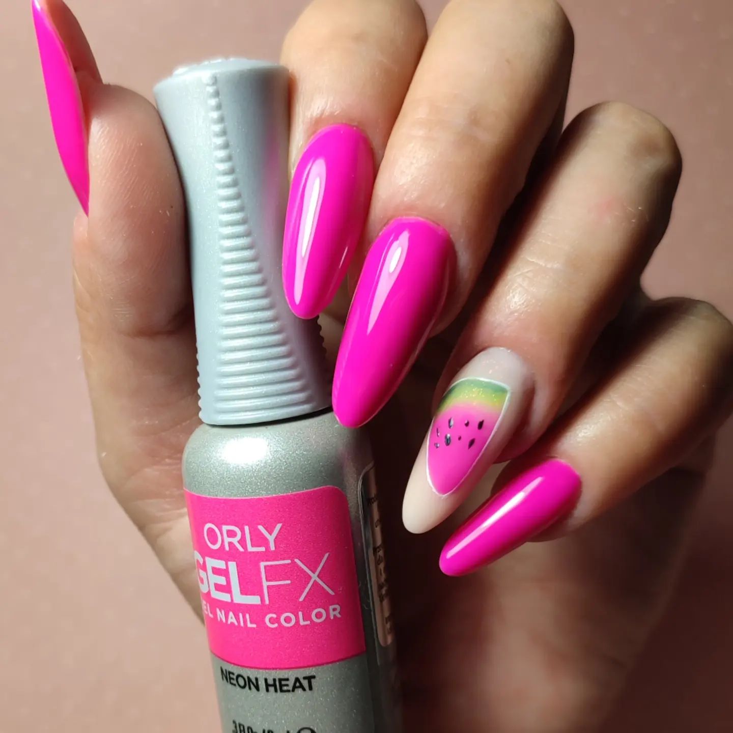Summer pink nails with a watermelon print and sticker will suit women who enjoy funny and funky nails.