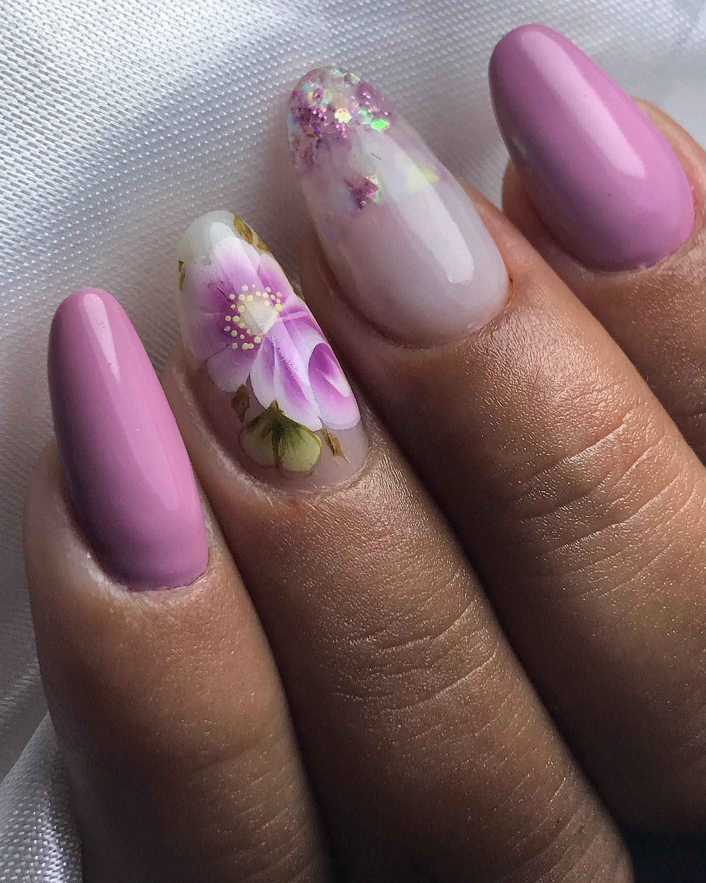Women who like floral artwork will enjoy this concept. Heads up since you have to have the right type of nail stickers to get this manicure.