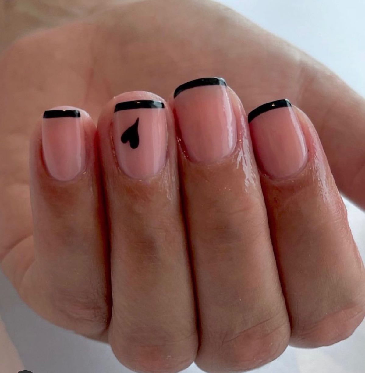 Short and simple is how you like it? If so, this mini and cute black French mani with a heart is for you!