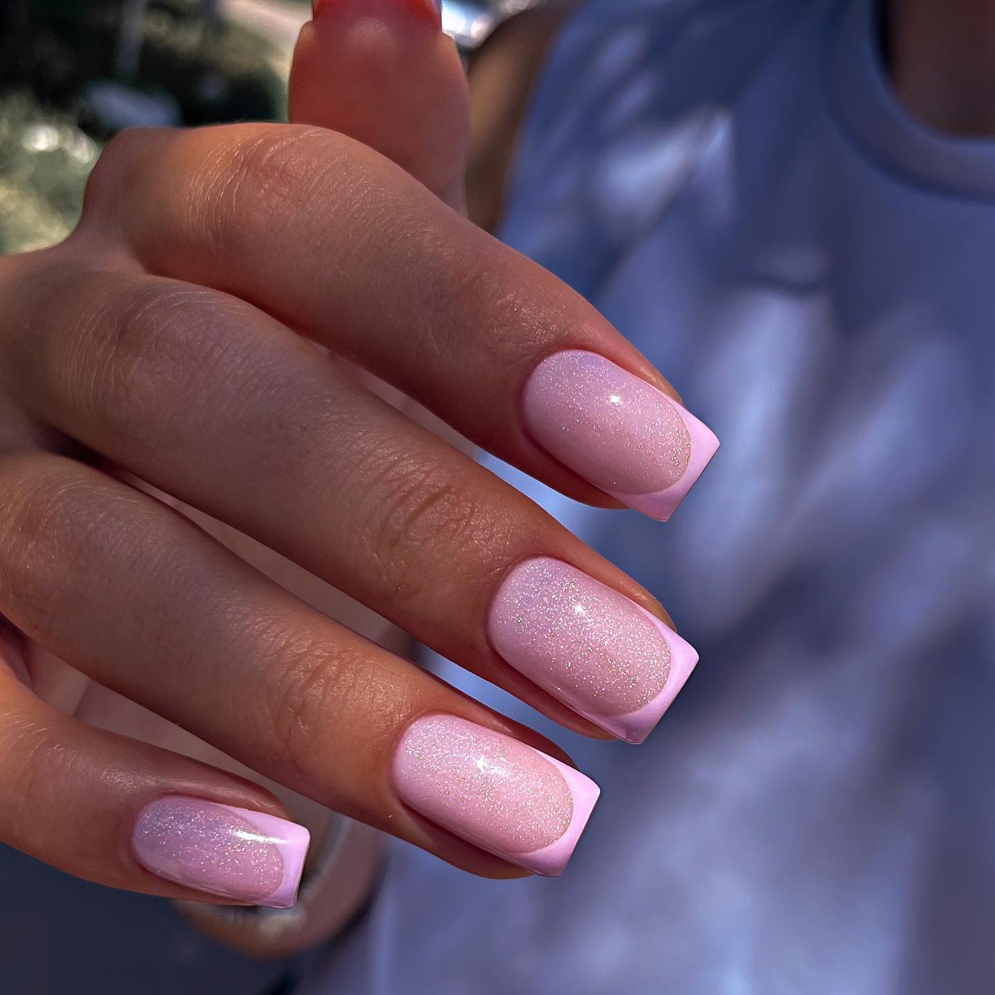 Want a bit of a different manicure? This one has a pink shimmery and glittery base, along with a subtle pink French nail tip. It is a bit different, yet so Barbie-like!