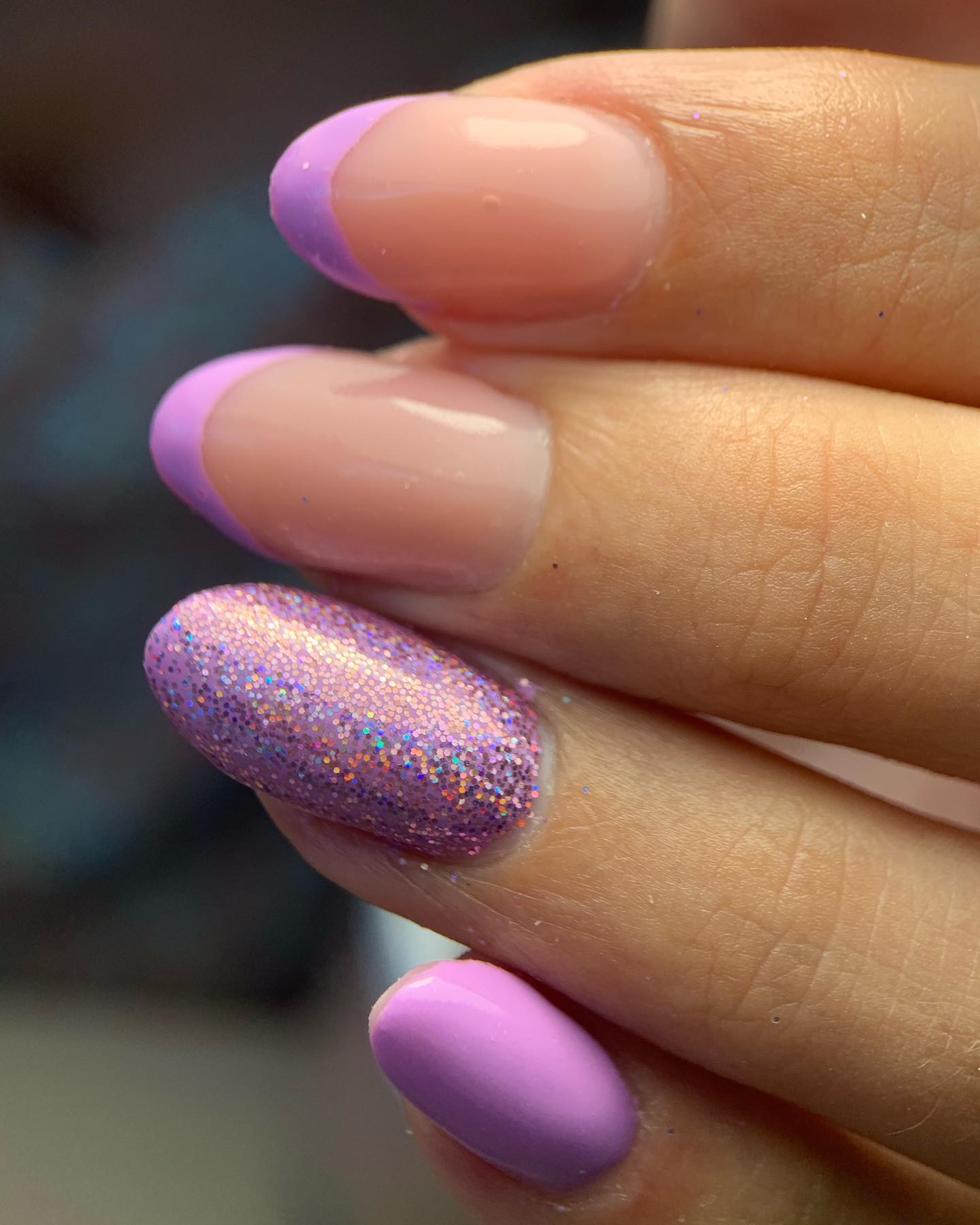 Add just a bit of glitter to your French manicure to spice it up. This design will suit women looking for a formal design.