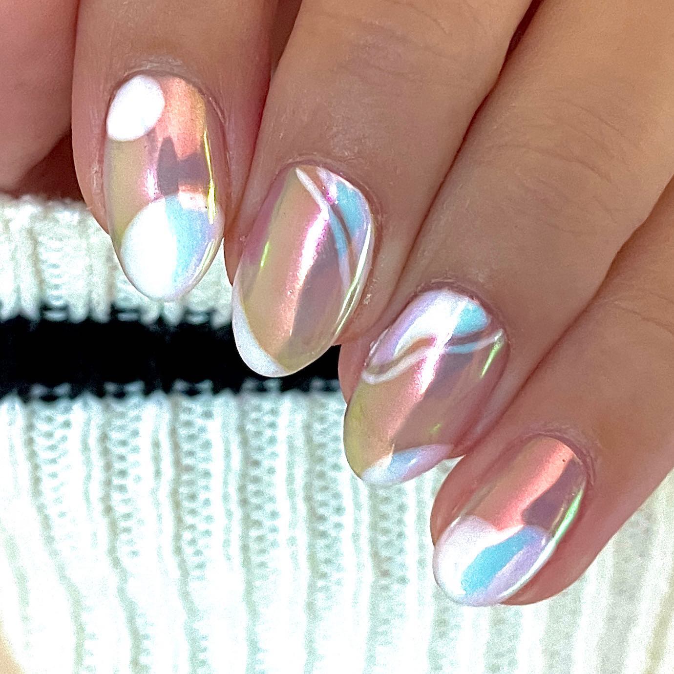 Glossy and so unique, this manicure is for those who enjoy glass-like ideas and weird quirky designs.