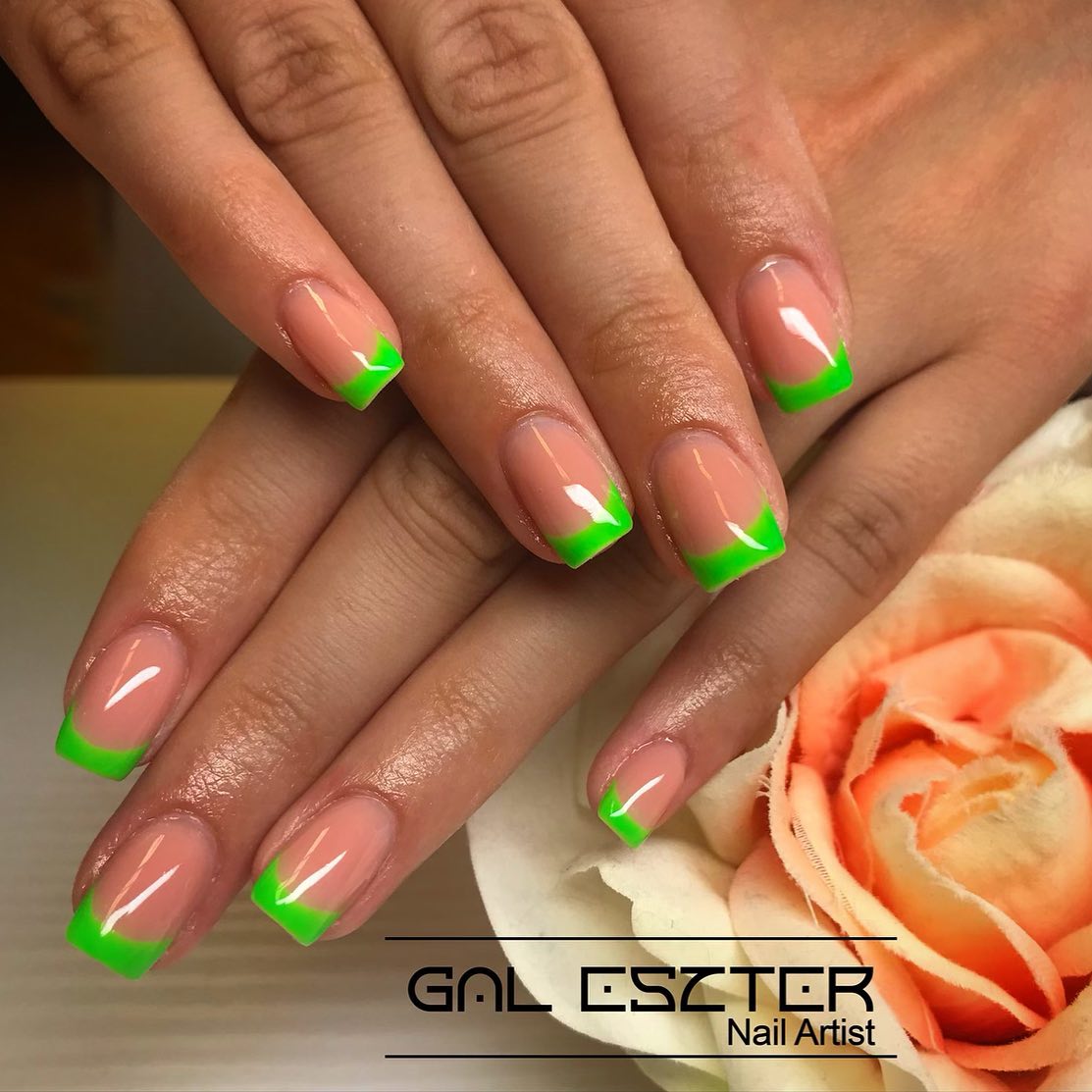 The square-shaped French mani and this pop of green will attract a lot of attention. If you like unusual green elements consider this design that you can do on your own and easily.