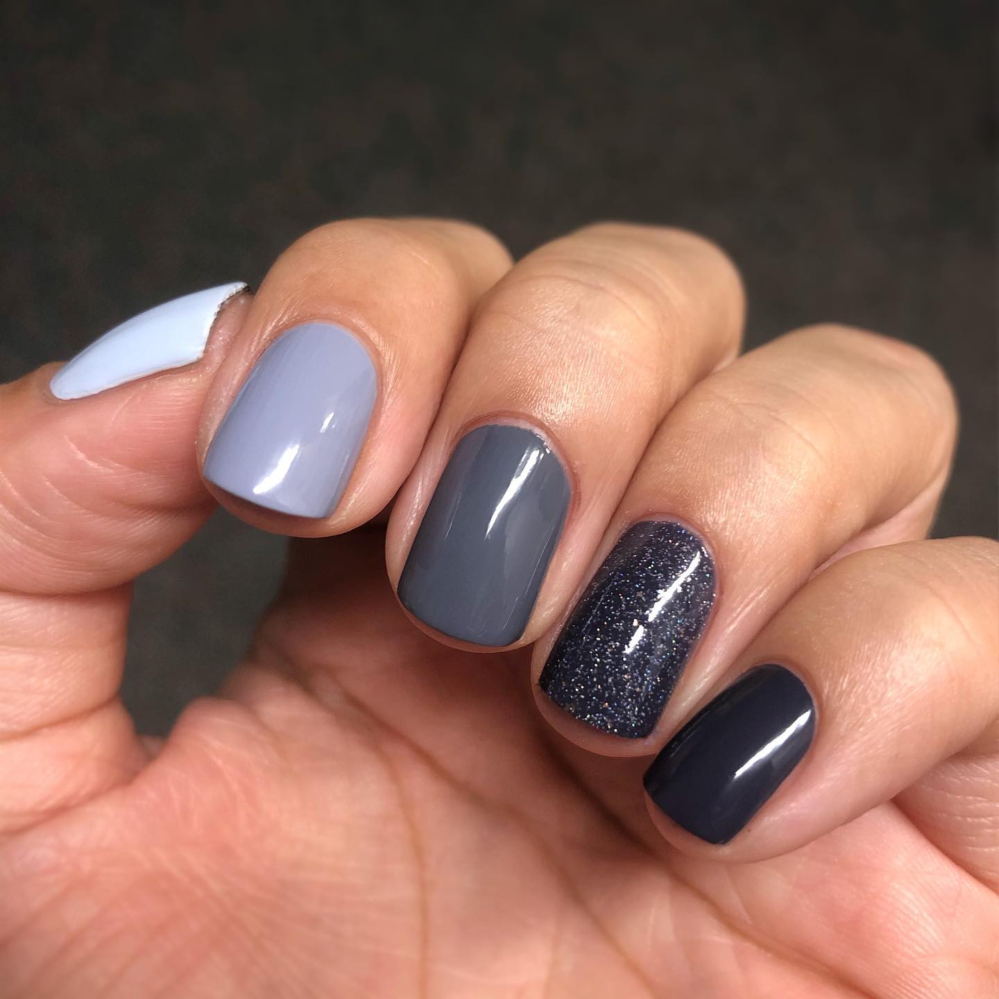 Grey nails such as these will work well for women who enjoy shorter neutral colors. These will also work well for the winter season.