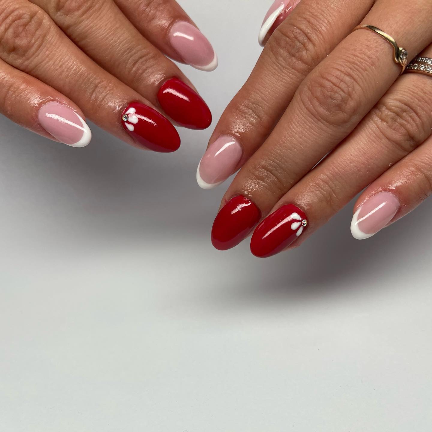 Maybe red french nails don't sound great to you. That's okay. You can combine the classic french nails with red ones.