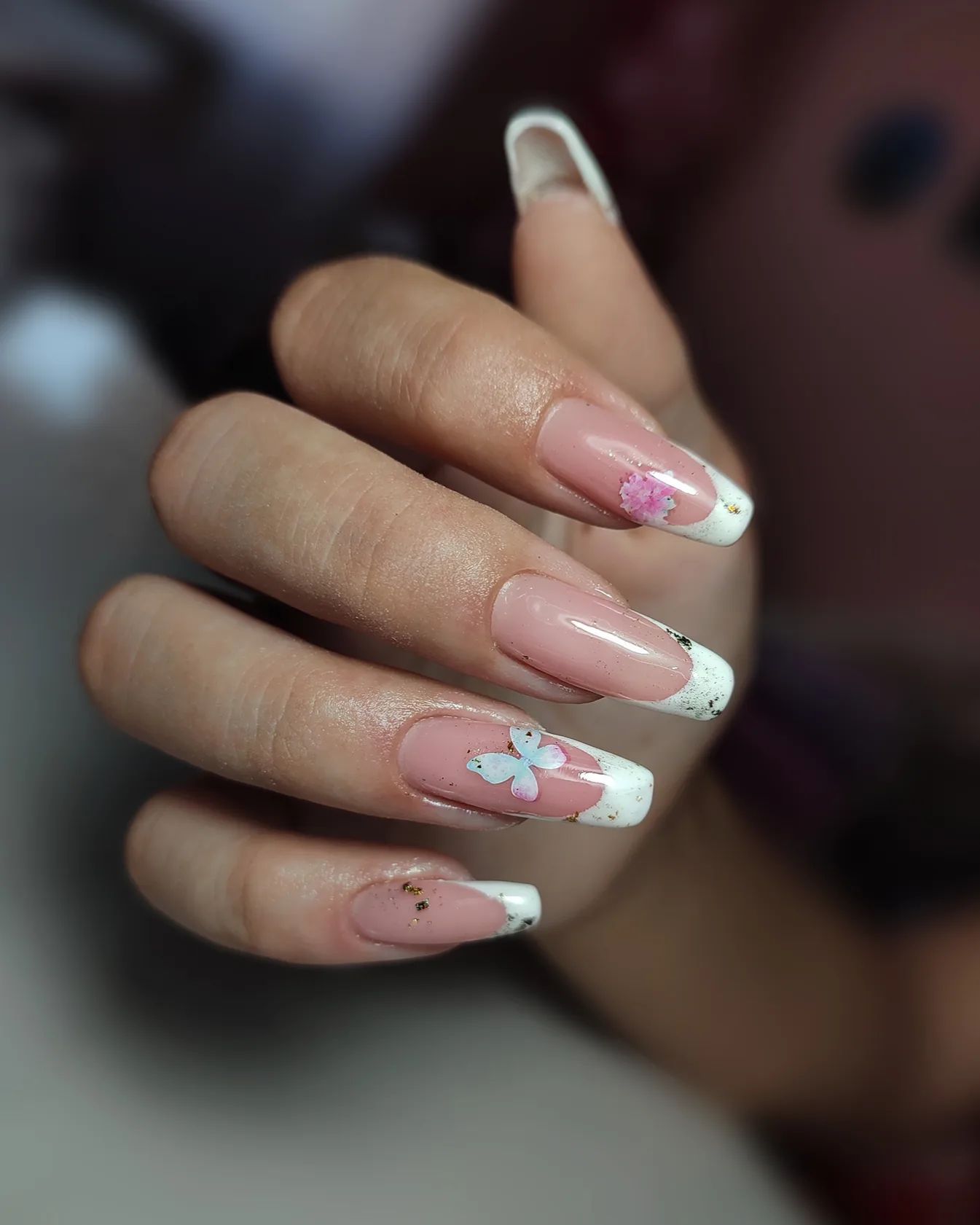 We all know that french manicures are so cool. There are some ways to make it more energetic like having a cute butterfly like the one above.