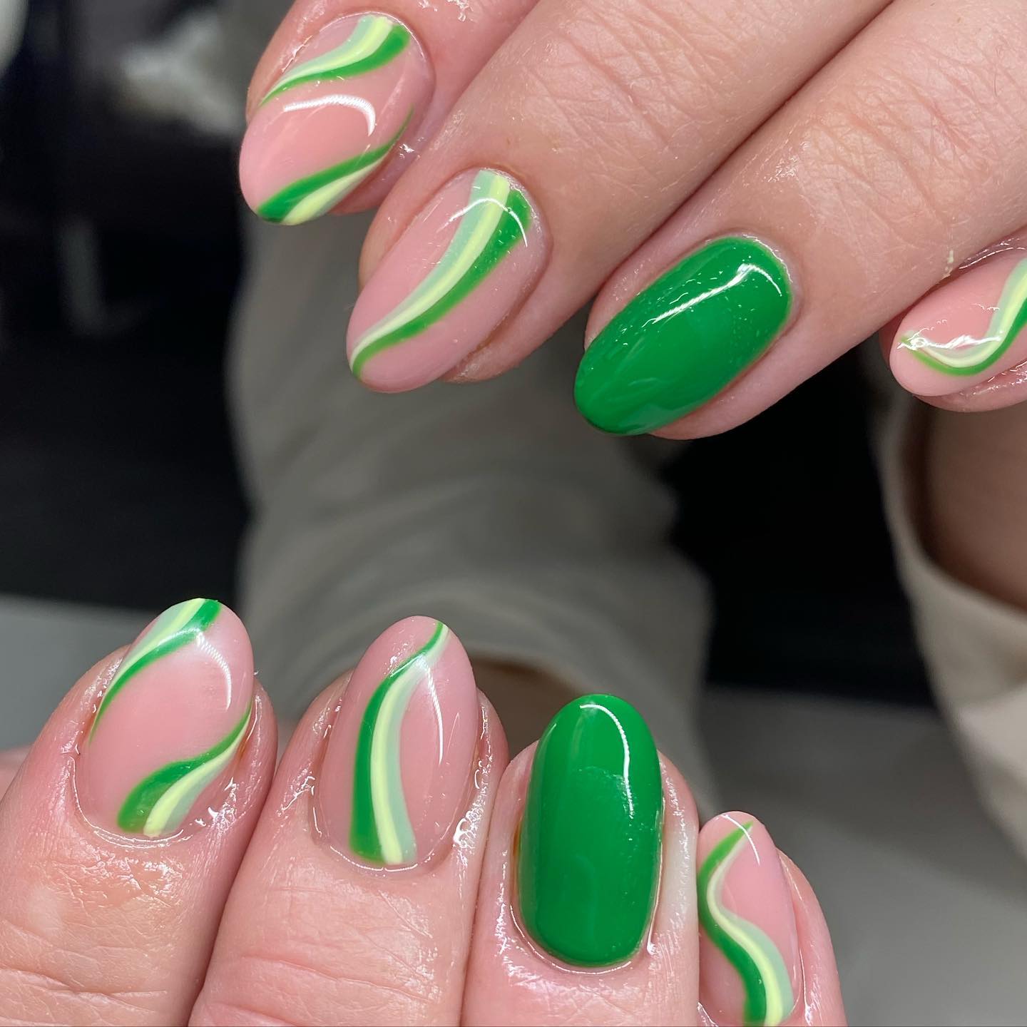 For those who like nail arts more than just classic and plain nails, here is a great look for you. You can use different shades of green on top of your nude nails.