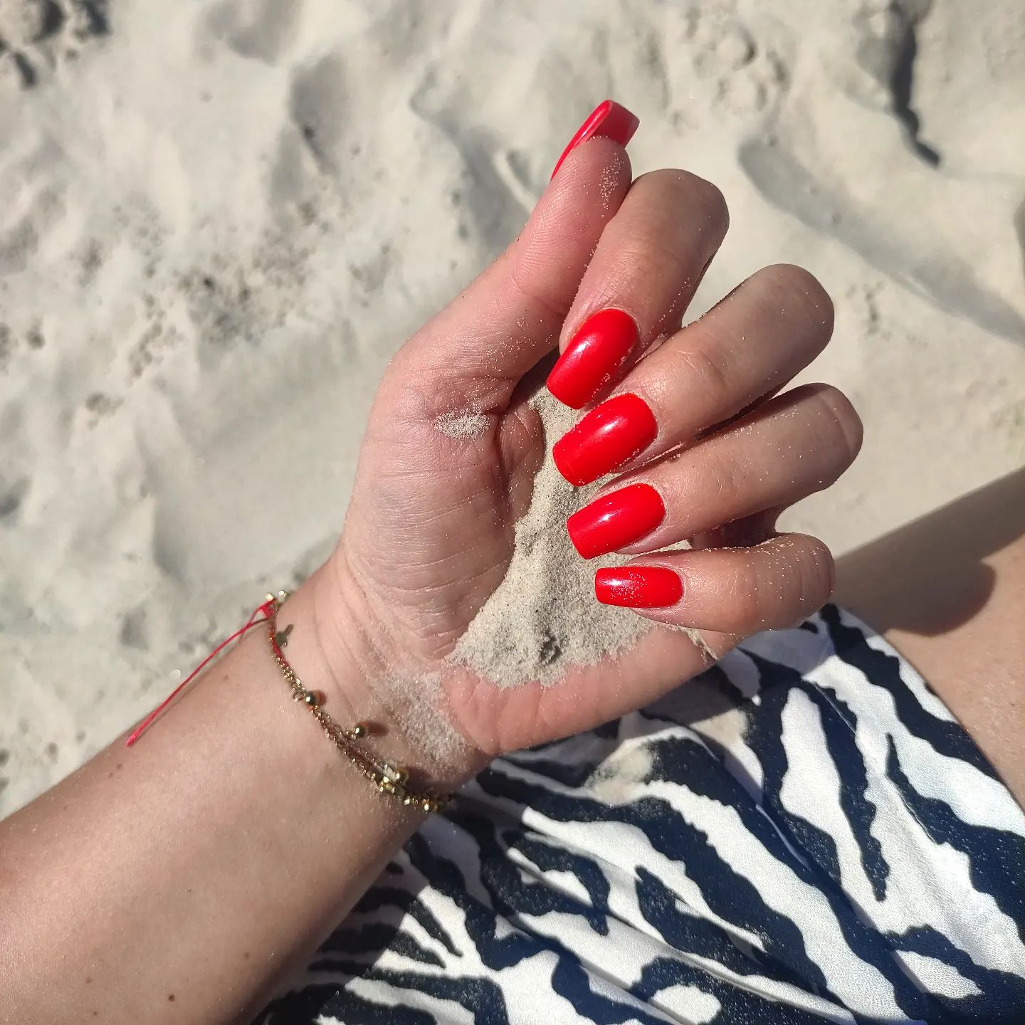  Red nails are always a good choice, especially for summertime. Your bright and super shiny nails are always one of favorites.
