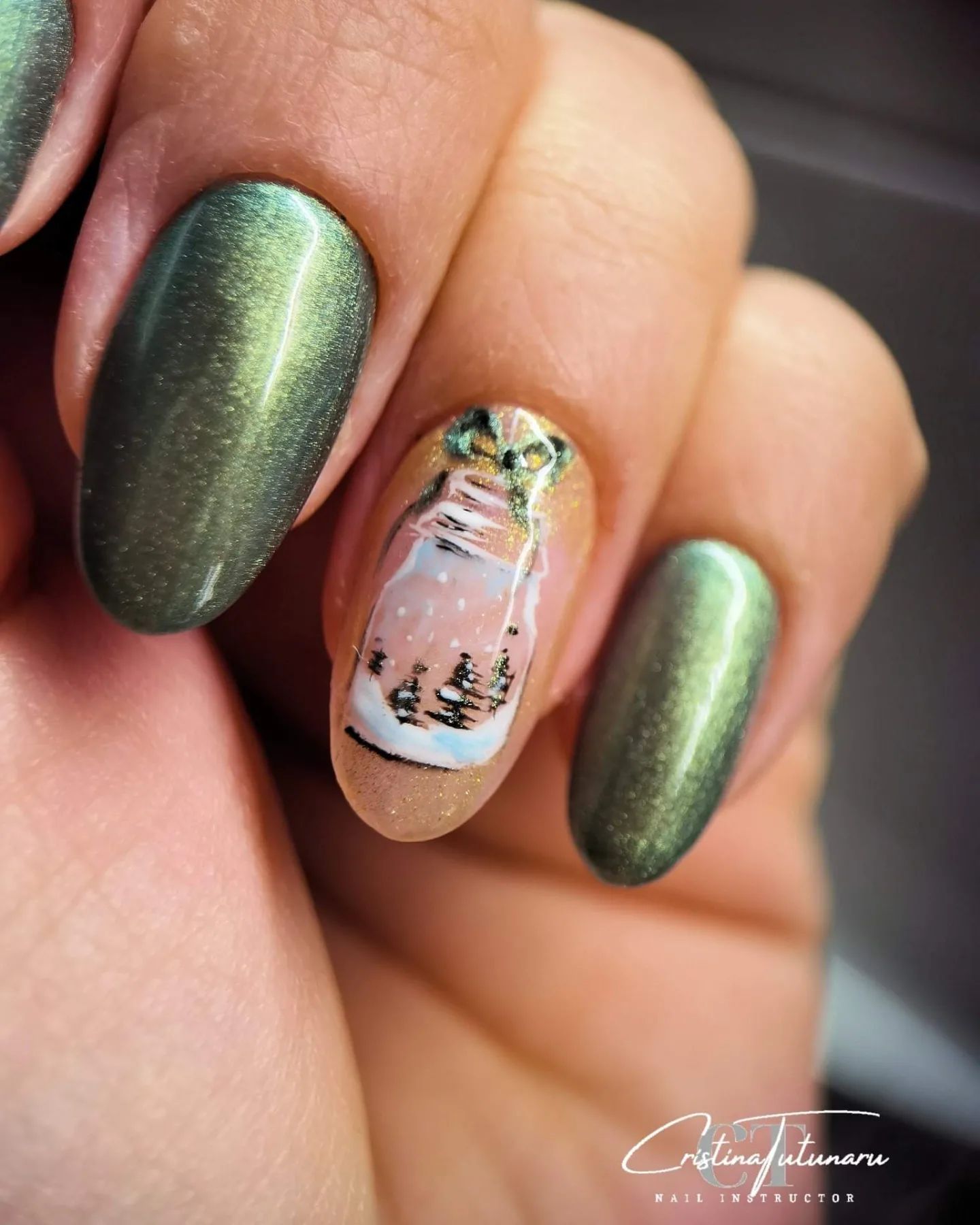 Mason jar snow globes are the perfect winter craft. In this jar, there are cute winter trees. Give this nail art a shot.