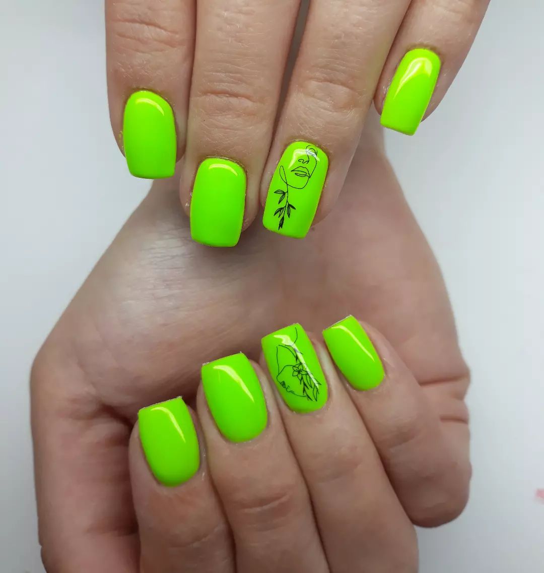 Line art portraits are quite amazing. If you use them on top of your neon nails, you will shine out.
