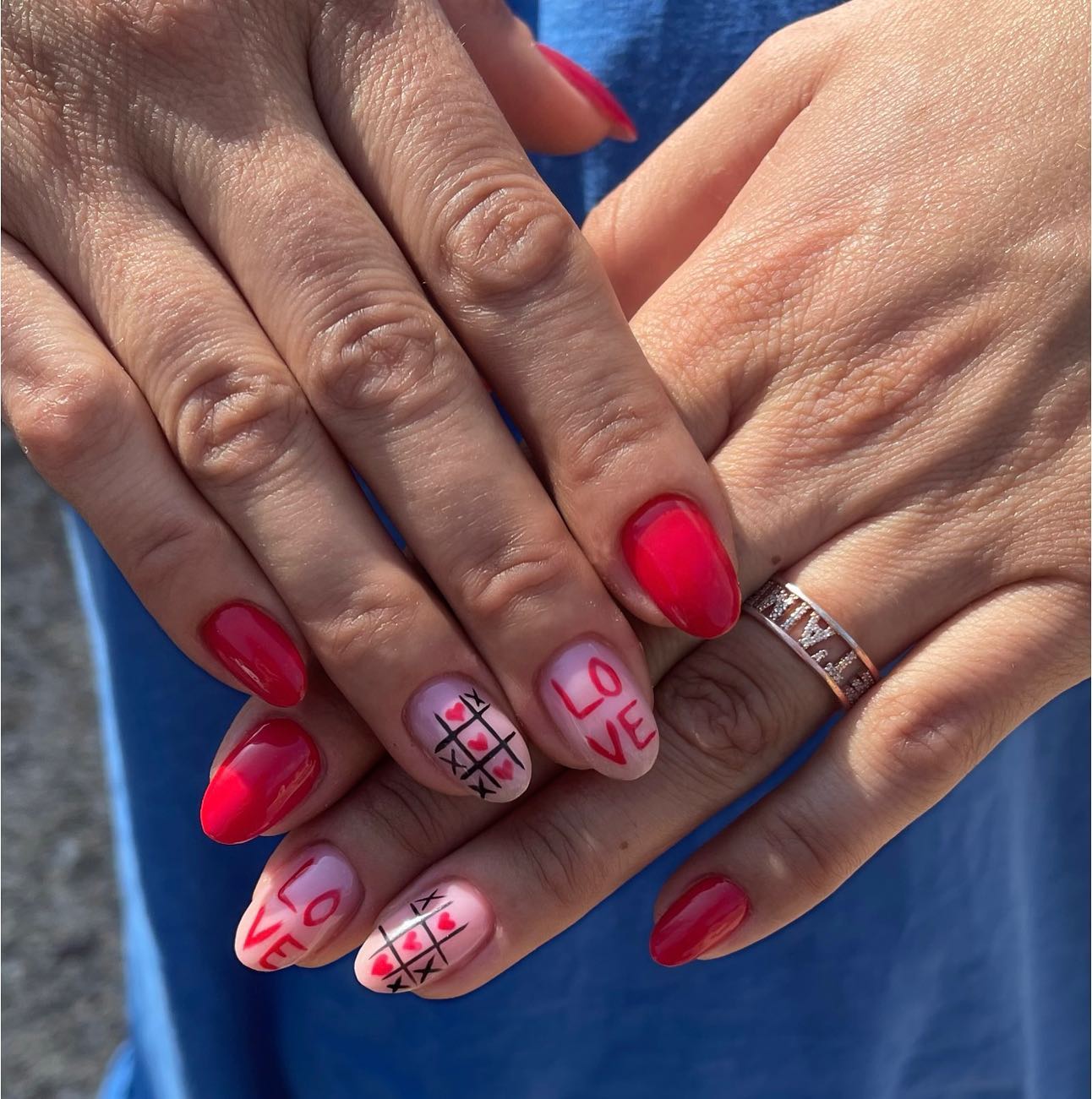 Romance and love is always associated with the color red. You can use some nail arts to show it off.