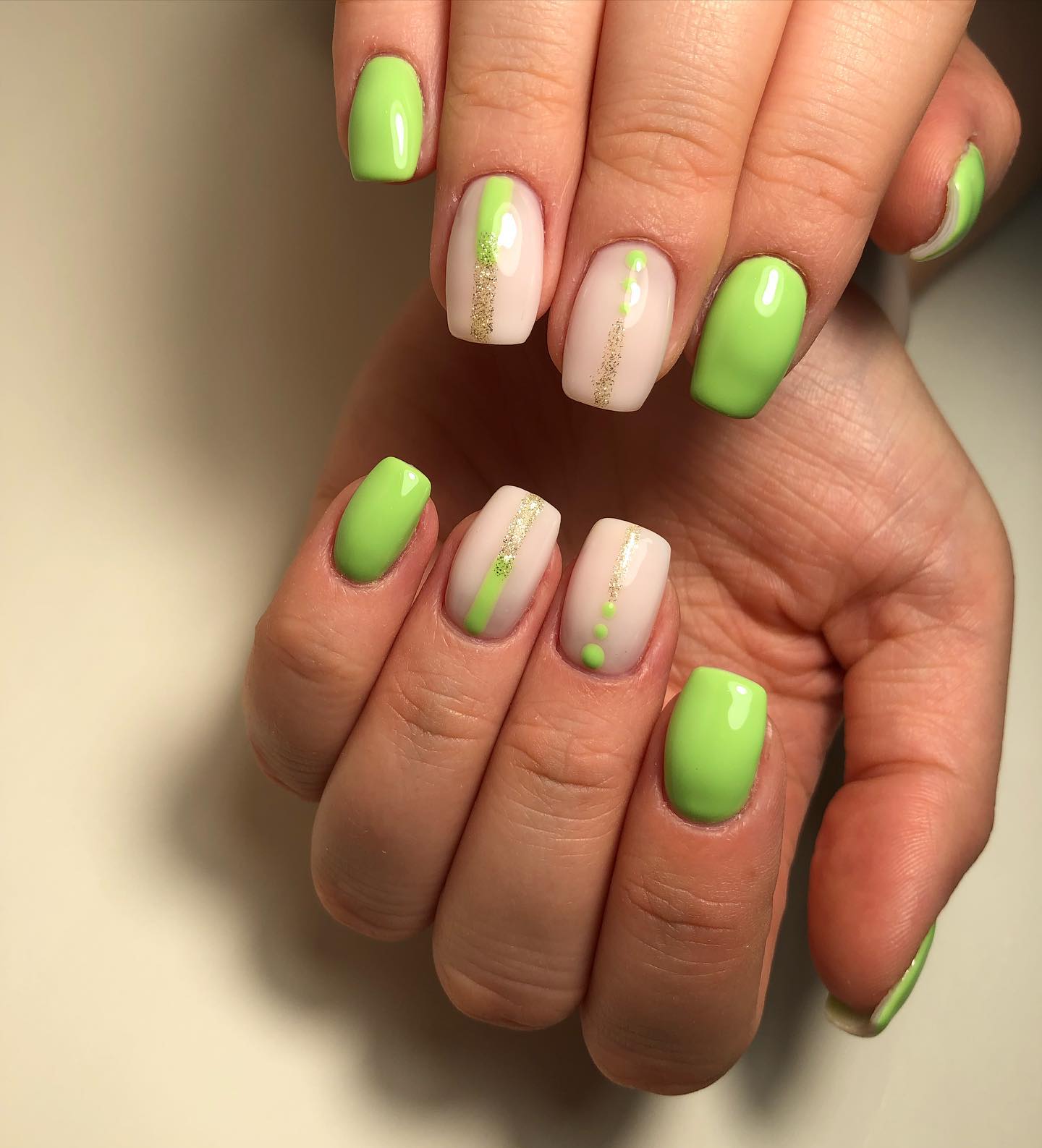 Light lime green with some nail arts on the transparent base are ready to create your nail style!