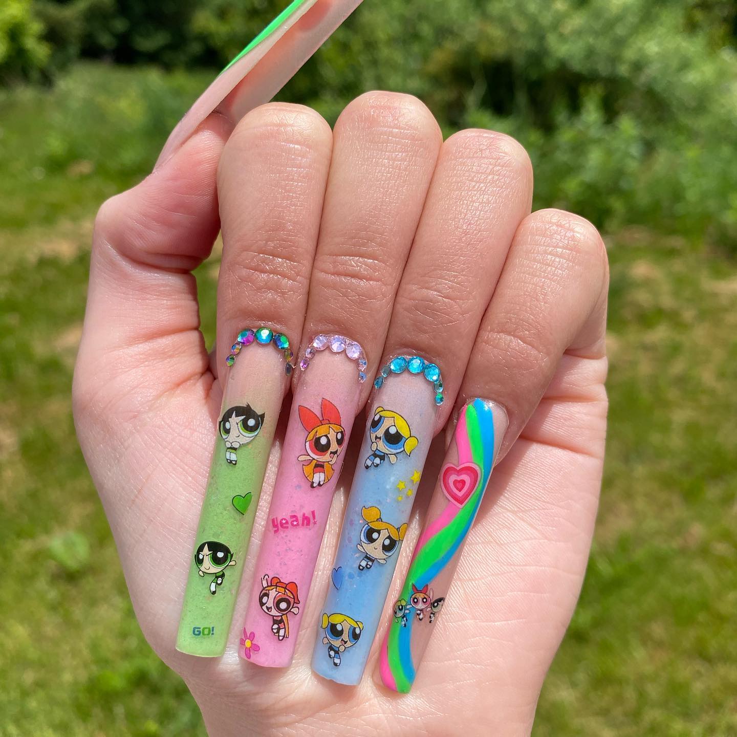 These acrylic nails may scare you but just look at these stickers! If you like Powerpuff girls, you should definitely go for it.