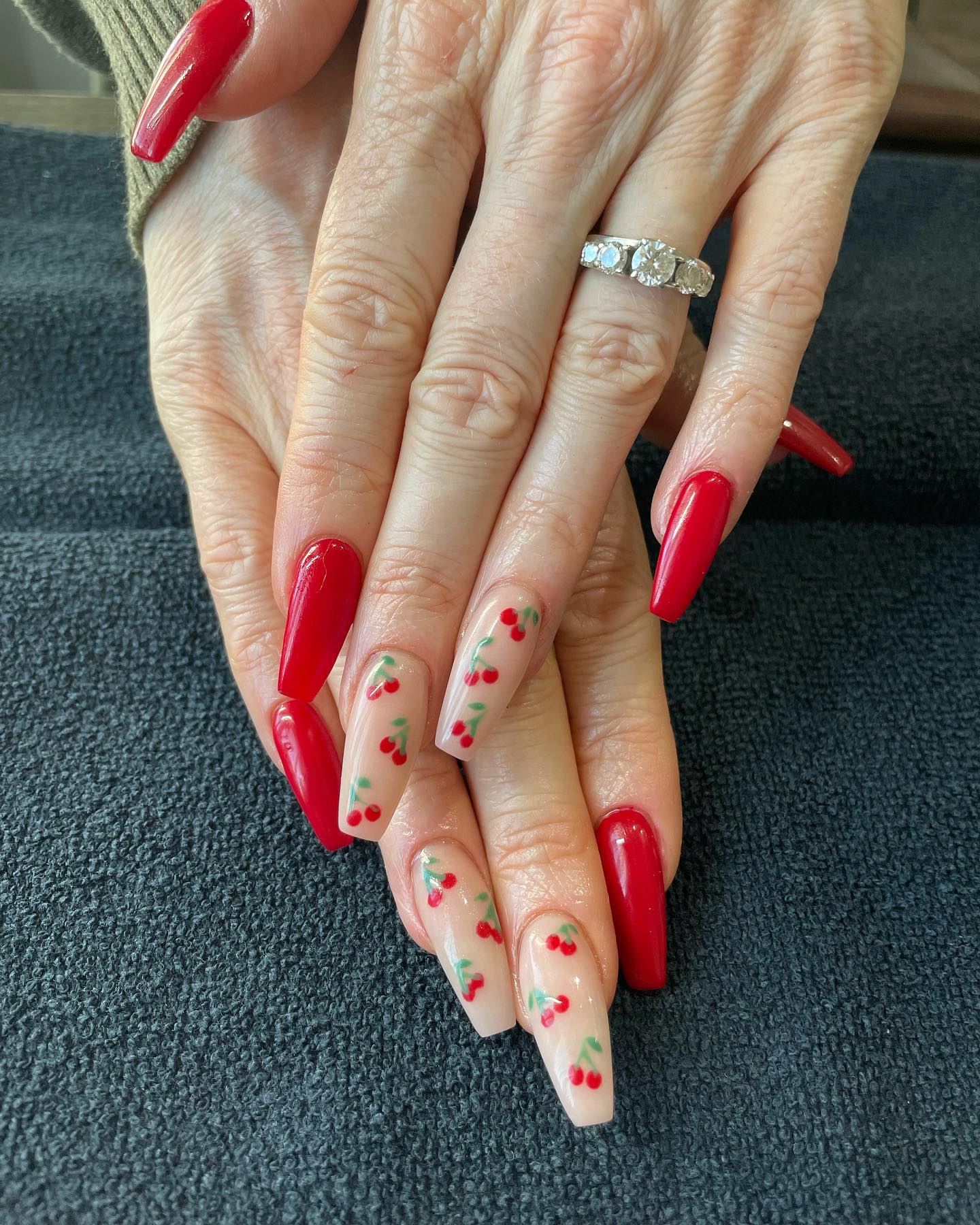 We can see cherries all around especially in summer. As accent nails, they are a cute choice to combine with red nails.