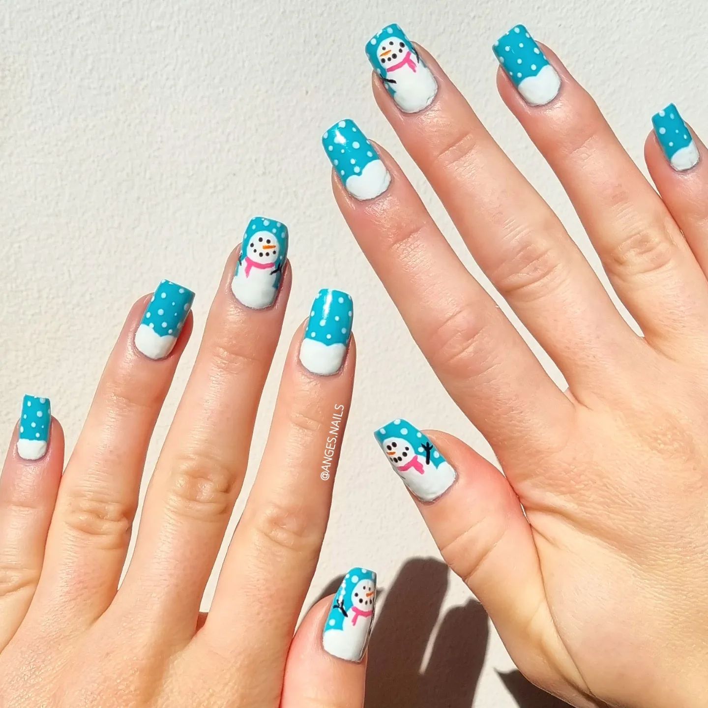 Snowmen again! They are adorable and one of the best way to use them is to have light blue base nails. In this way, they will stand out easily.