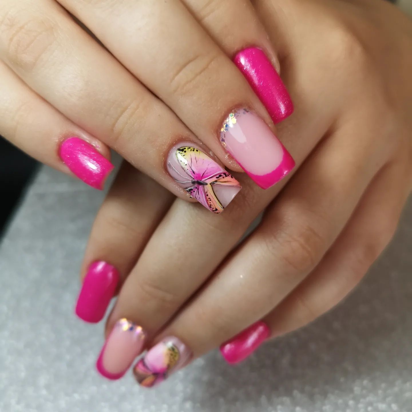 If you don't want to cover all of your nails with butterflies, here is a great idea. One pinky butterfly on one of your nails will look great.