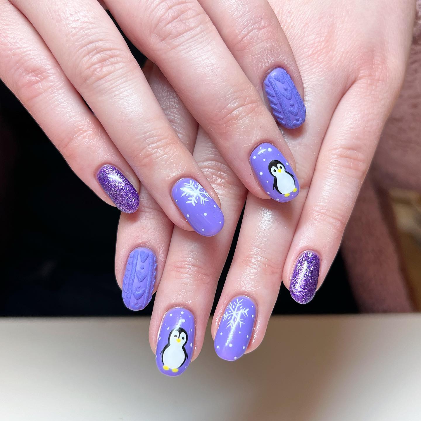 Here is one of the cutest nail arts. For your purple nails, you can have different nail designs for each of your finger.
