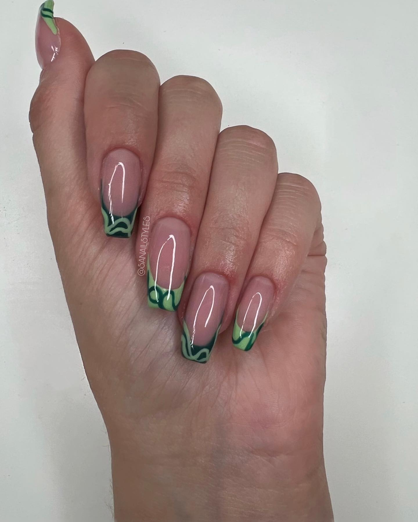 Here is another idea for green french manicure. The beauty of mixing dark and light green colors is just amazing.