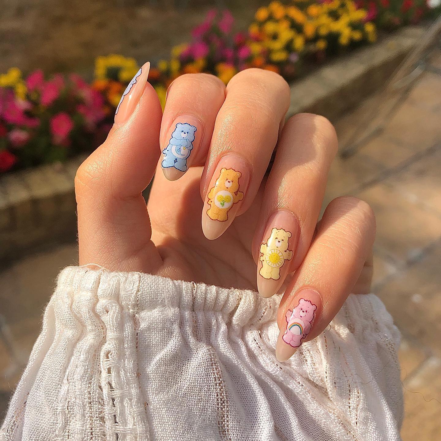  It doesn't matter how old you are, we girls always love teddy bears. Care bear stickers are so cute to try on nails. Plus, they are all colorful.