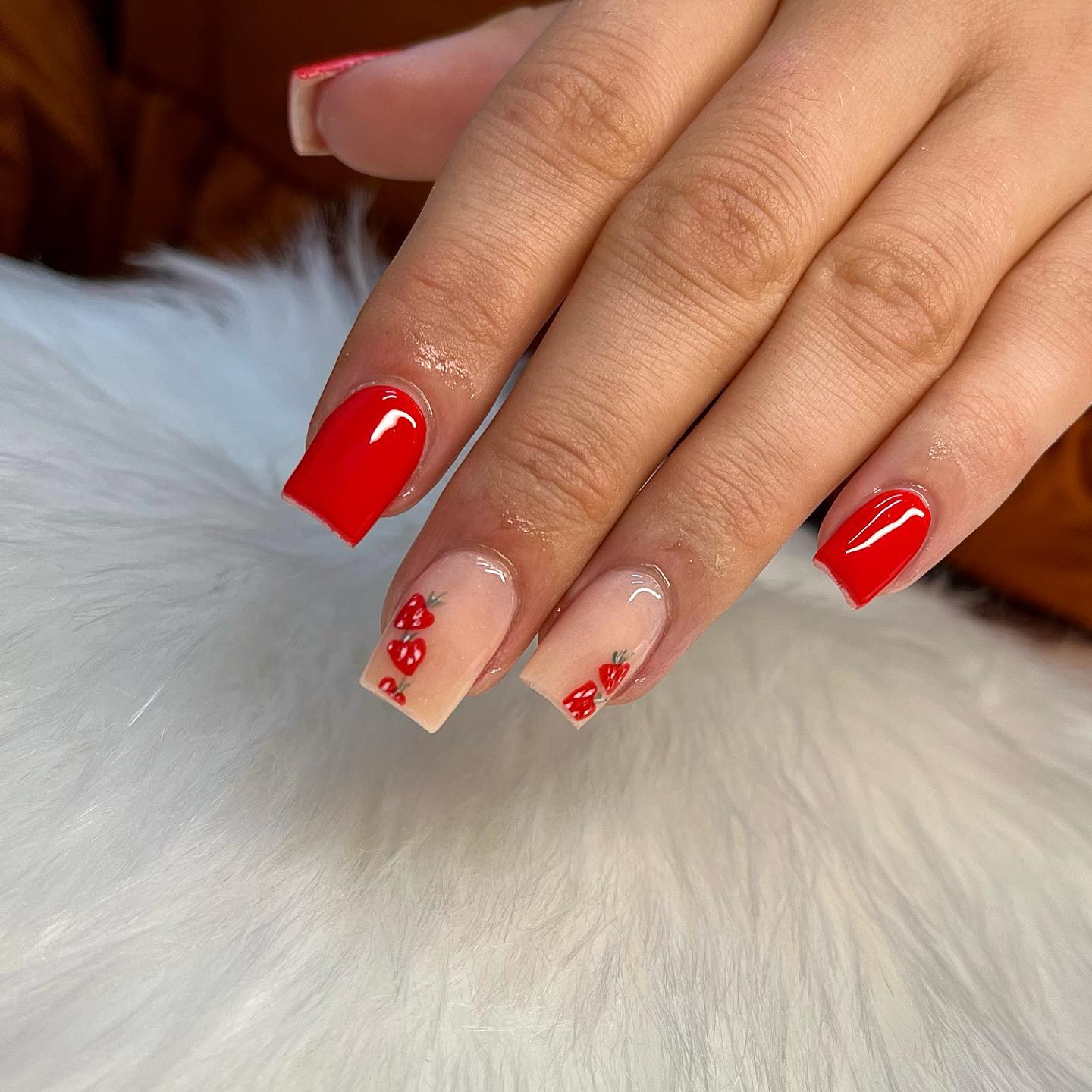 Which fruit comes to your mind when we say red? Strawberry is one of them, for sure. Why not adding little cute strawberries on your nails?