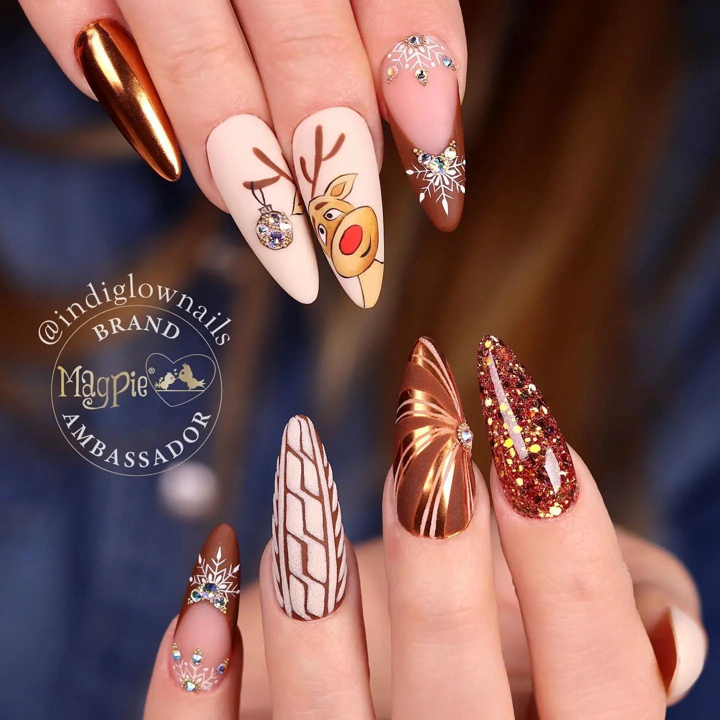 Deers are iconic animals of winter. A deer inspired christmas nail is a great idea with all of its ornaments and brown nail polish.