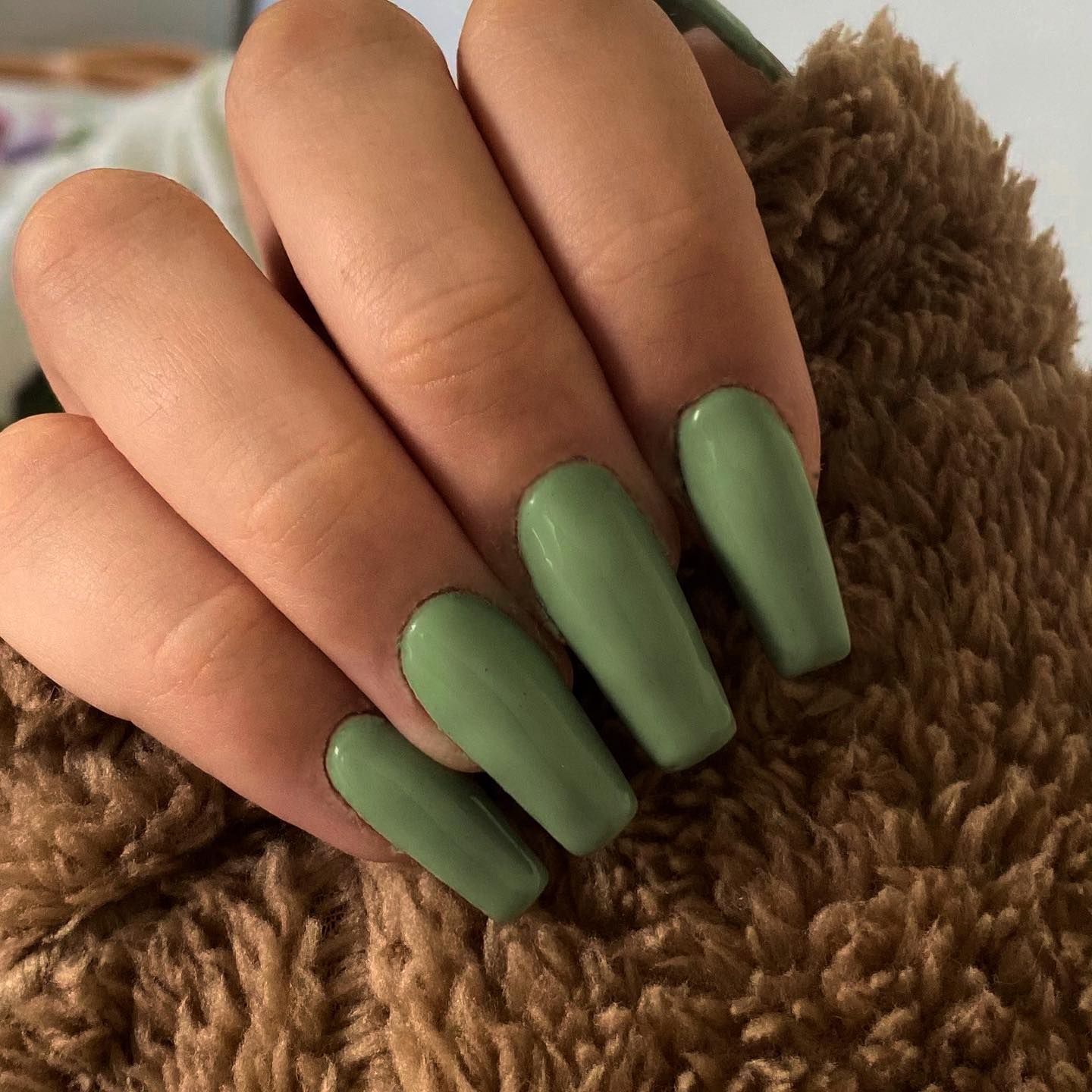 This shade of green looks more like an army green. Classy and chic look can be achieved with these pastel nails.
