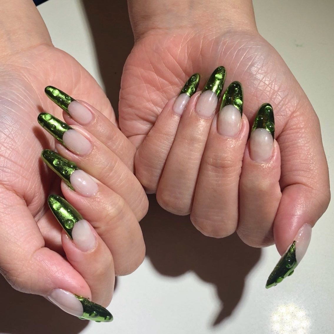 You can wear emeralds on your nails with this great mani. Emerald nail tips will take your manicure to a new level.