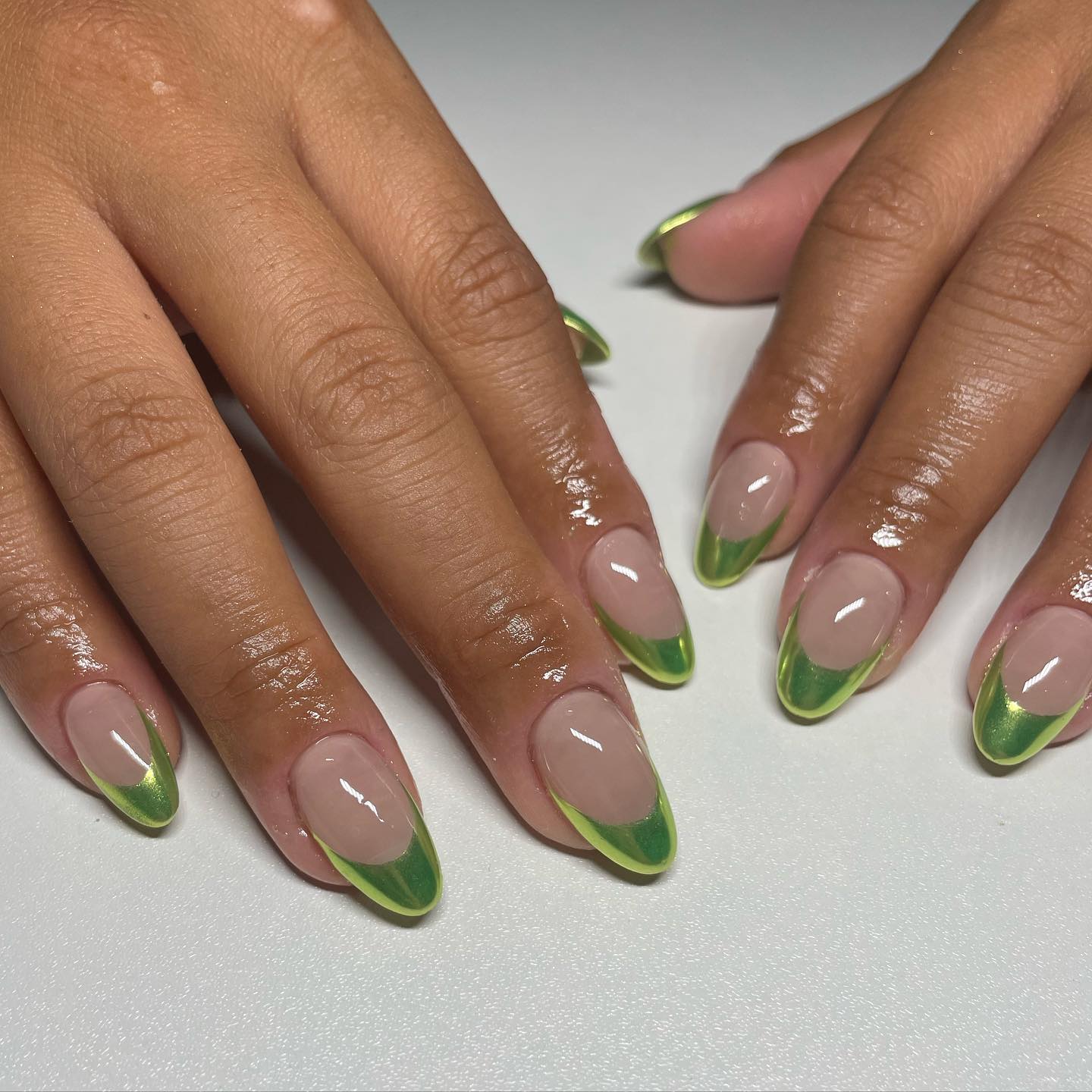 If you can't give up on applying a French manicure and you like green color, the example above is the best for you.