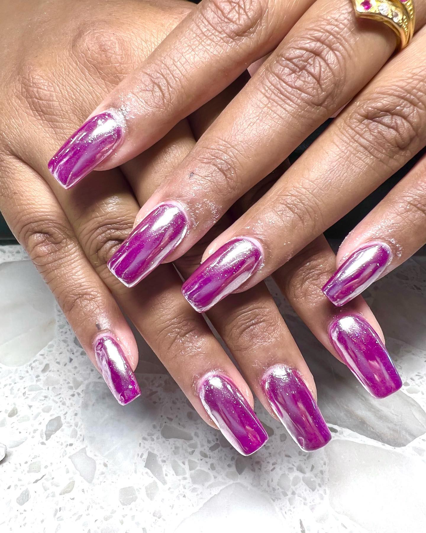 Purple is a color of boldness and a chic look is easy to achieve with it. Long square nails will add an extra beauty to it.