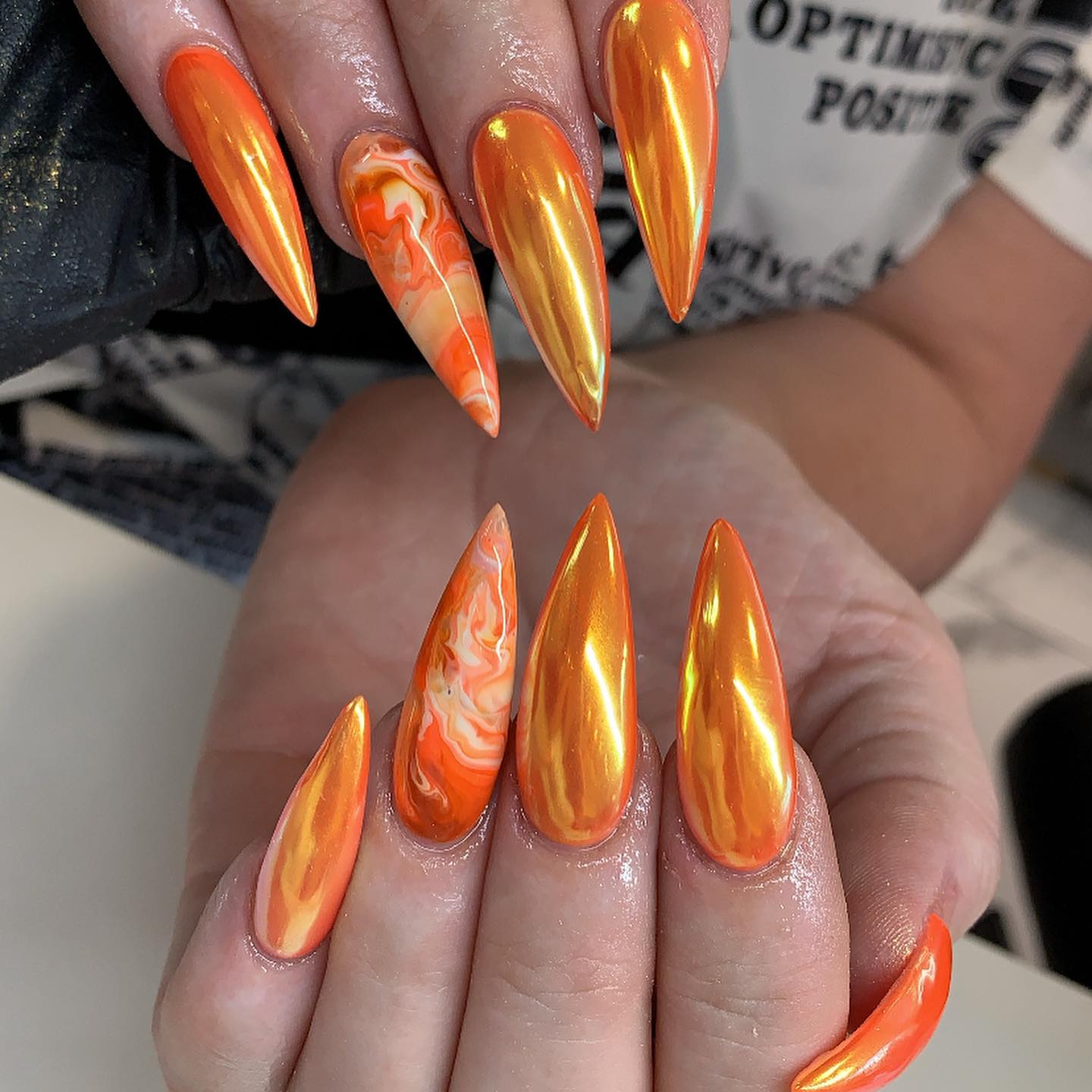 Orange nails are quite original and popular. To try something new and look amazing in sunny days, you should definitely use this color.