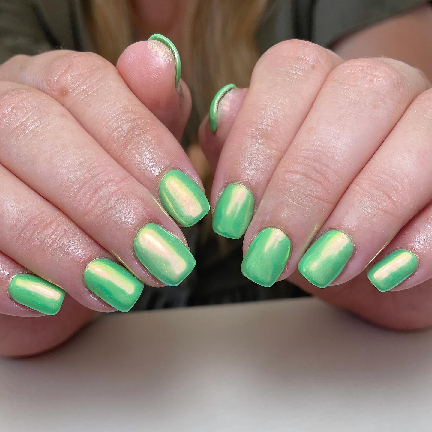 All shades of green are perfect but light green is always a favourite one. For your short nails, light green chrome nail polish is a nice idea.
