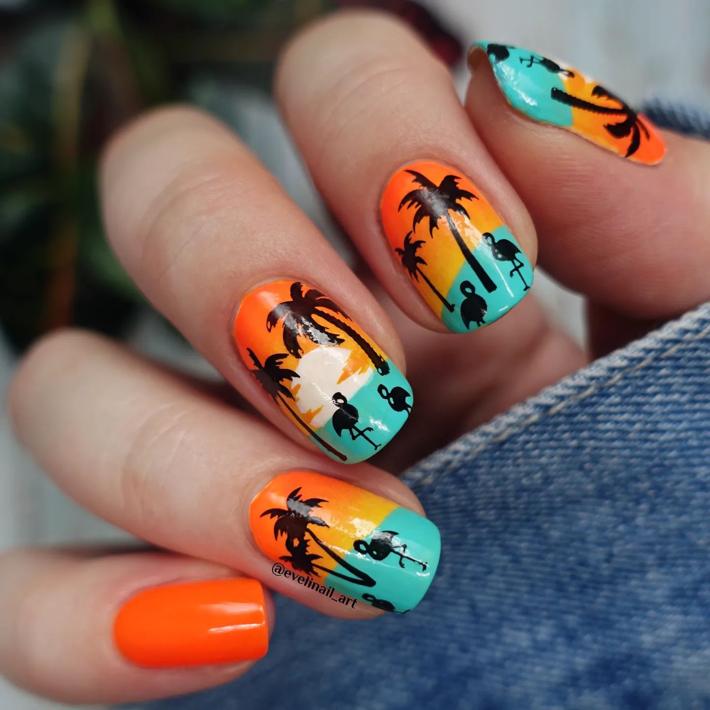 Are you a fan of Hawaiian vibes? Well, to show these vibes on your nails, you should definitely go for this orange and turquoise neon nails!