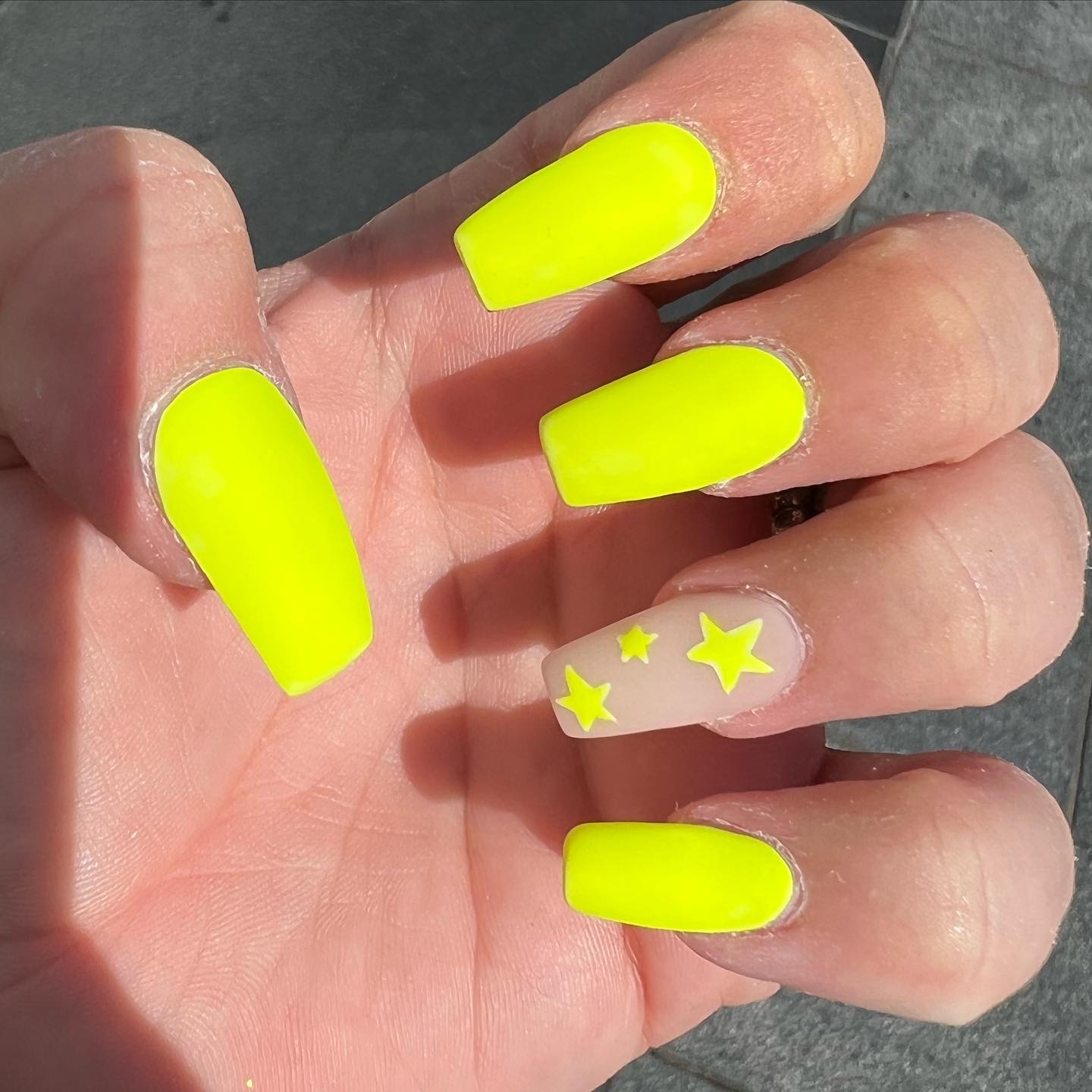 This light yellow matte nails with a star nail art design are all you need to shine out. Whenever you look at your nails, they will make you happy.