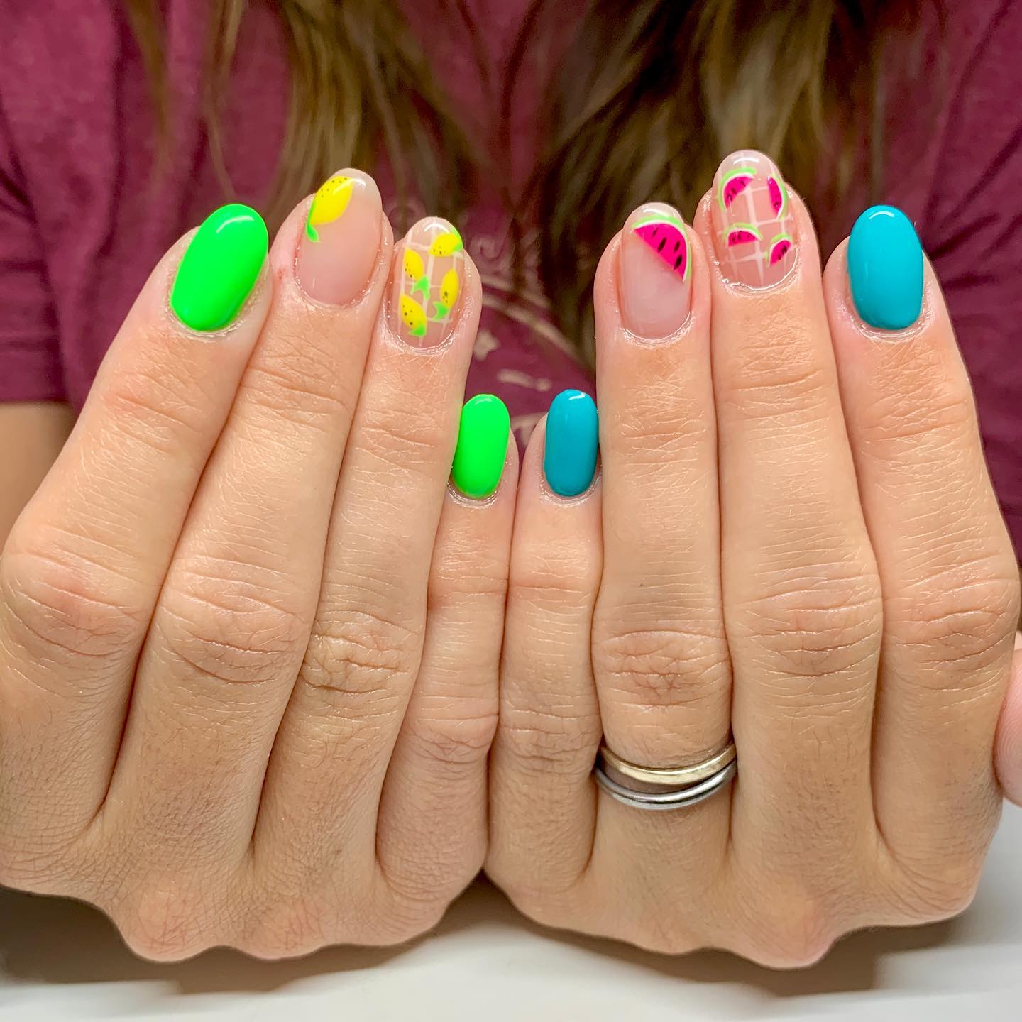 Here is a nice idea for indecisive women again. Yellow, green, blue and pink colors are used in just one nail design here. Watermelon and lemon nail arts are so cute to try on your nails.