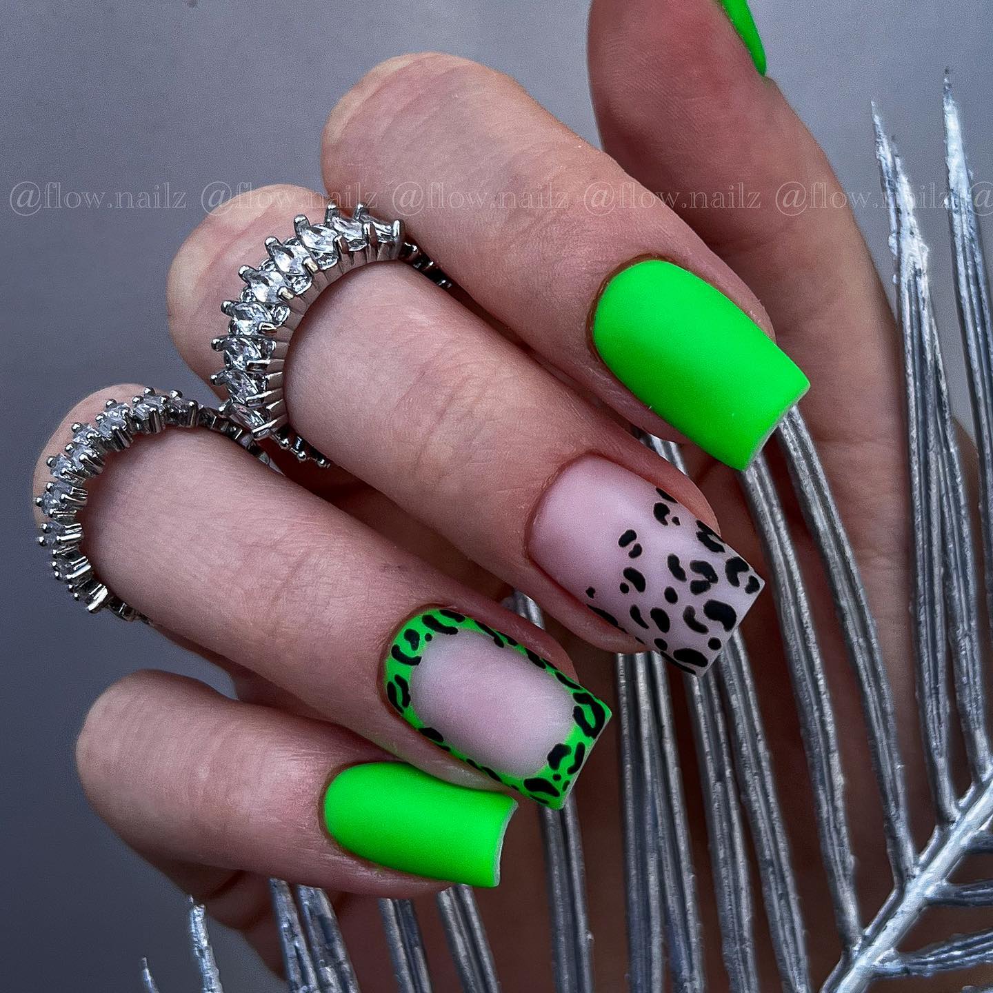 Matte green is ready to rock your nails with leopard prints on it. For your ring finger, you can use a distinct nail art: a green leopard print frame.