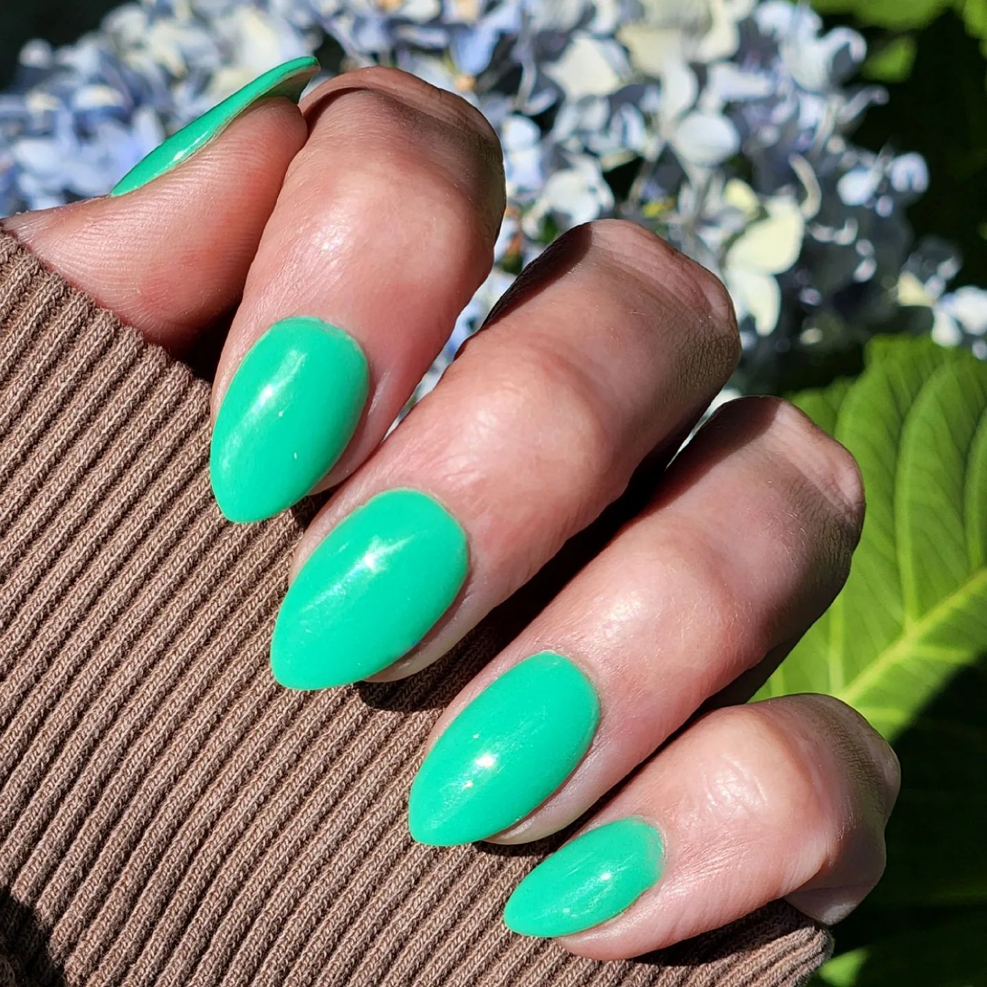 This perfect shade of green will amaze you with its bright look. You should consider mint green neon nails as your next manicure.