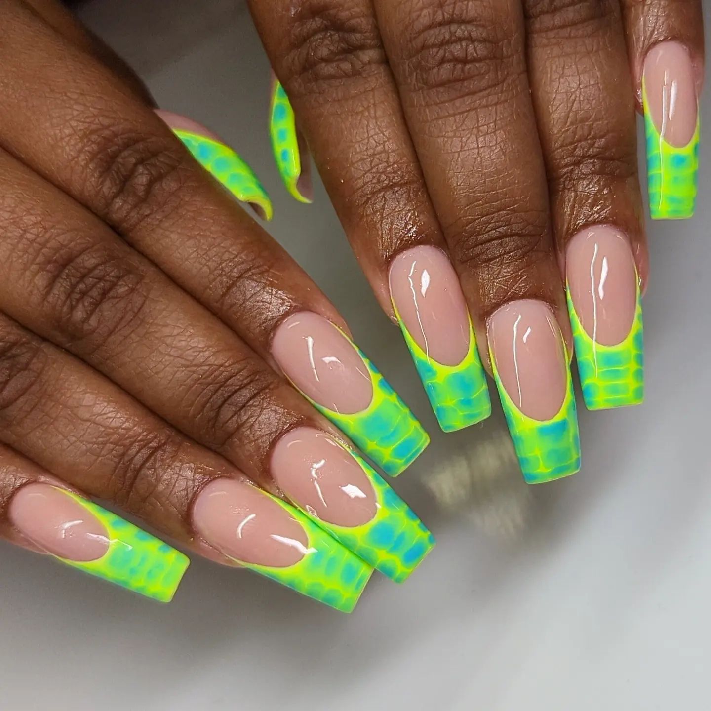  French mani is one of the best manicures and we all know that. To make it distinctive, neon green nail polish can be used for your French tips.