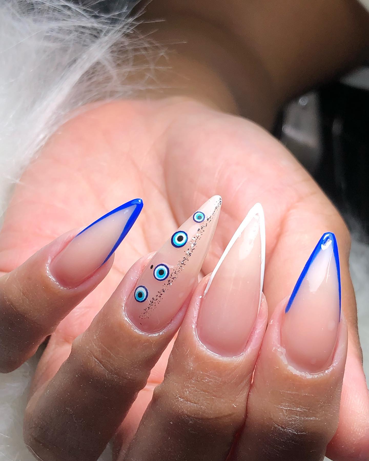 Wearing an evil eye is believed to protect you from evil, so wearing it as nail stickers is  great idea for your stiletto nails.