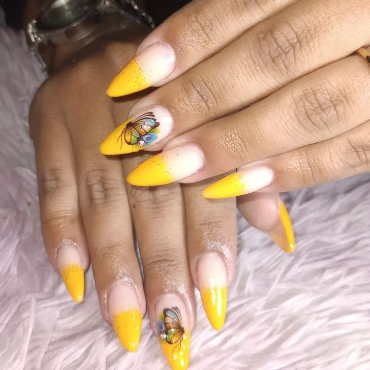  Can you feel the summer vibe? When half nude and half yellow nails are combined with butterfly accent nails, what else do you need to be perfect? Nothing!