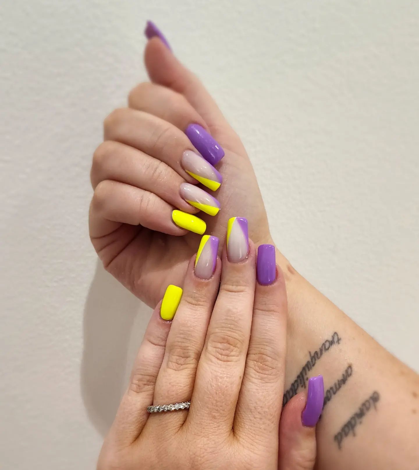 Mixing two awesome colors is always a good idea to make a combo. Yellow and purple summer nail colors are ready to make you look fabulous.