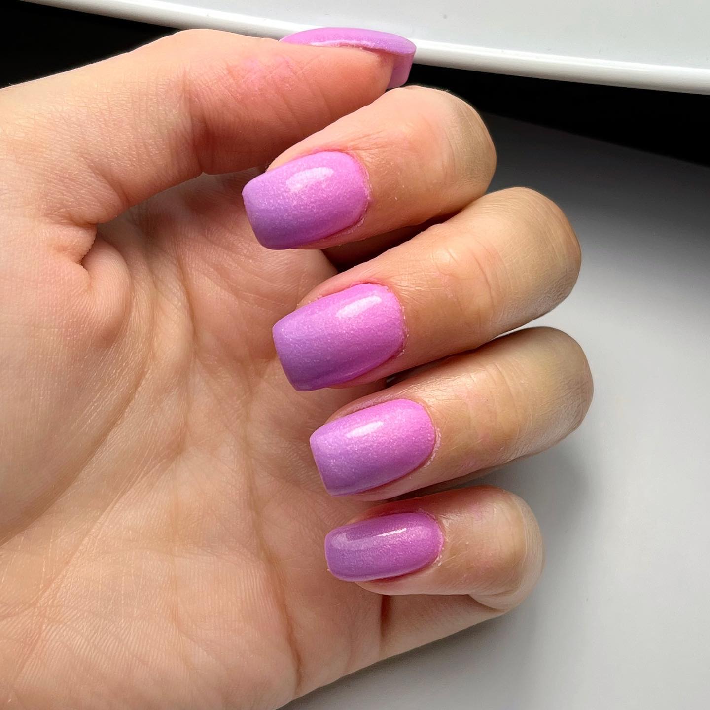Have you ever seen a cute ombre nail like this? Purple lovers will adore it. A darker shade of purple is on the nail tips and it gives a great look.