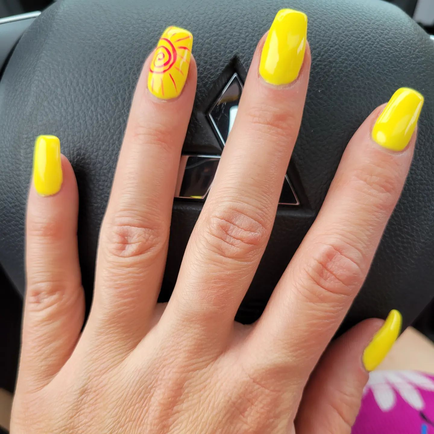 The color of Sun, yellow, is a great choice to apply for your summer nails. Plus, you can draw a sun for your accent nail.